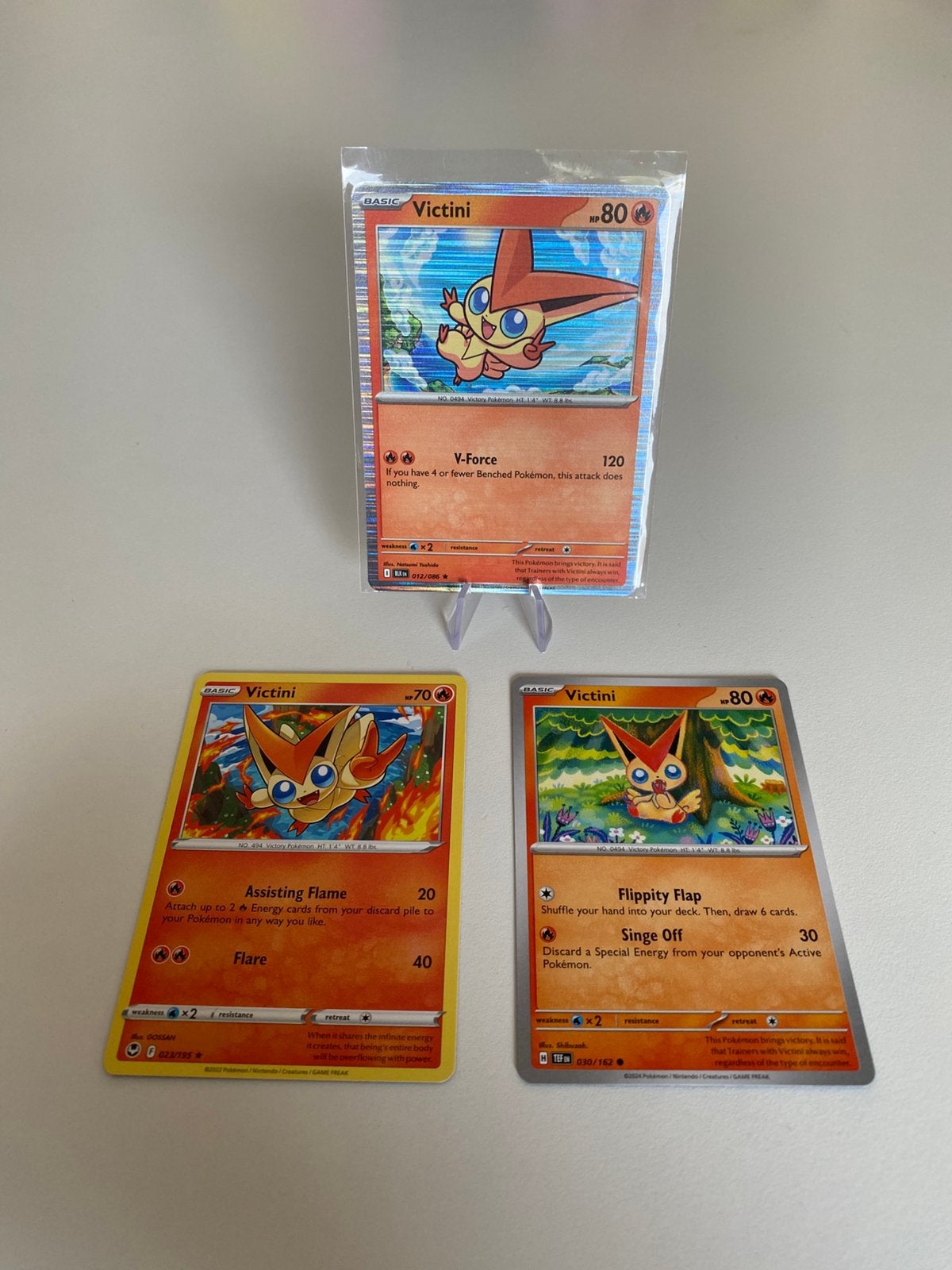 Victini Setje Nm, Hobby en Vrije tijd, Verzamelkaartspellen | Pokémon, Ophalen of Verzenden, Zo goed als nieuw