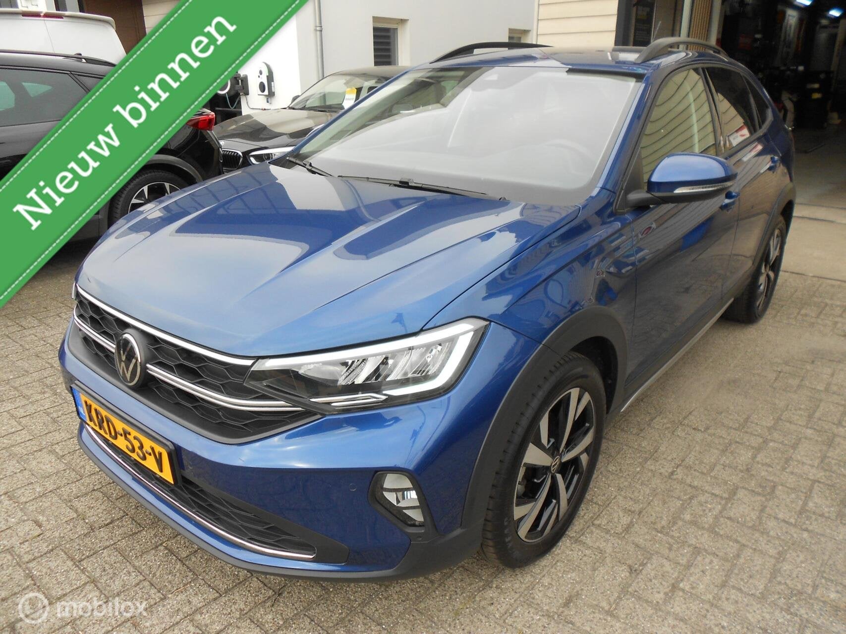 Volkswagen Taigo 1.0 TSI Life Edition Automaat 116 PK, Auto's, Stof, Gebruikt, Met garantie (alle), Blauw