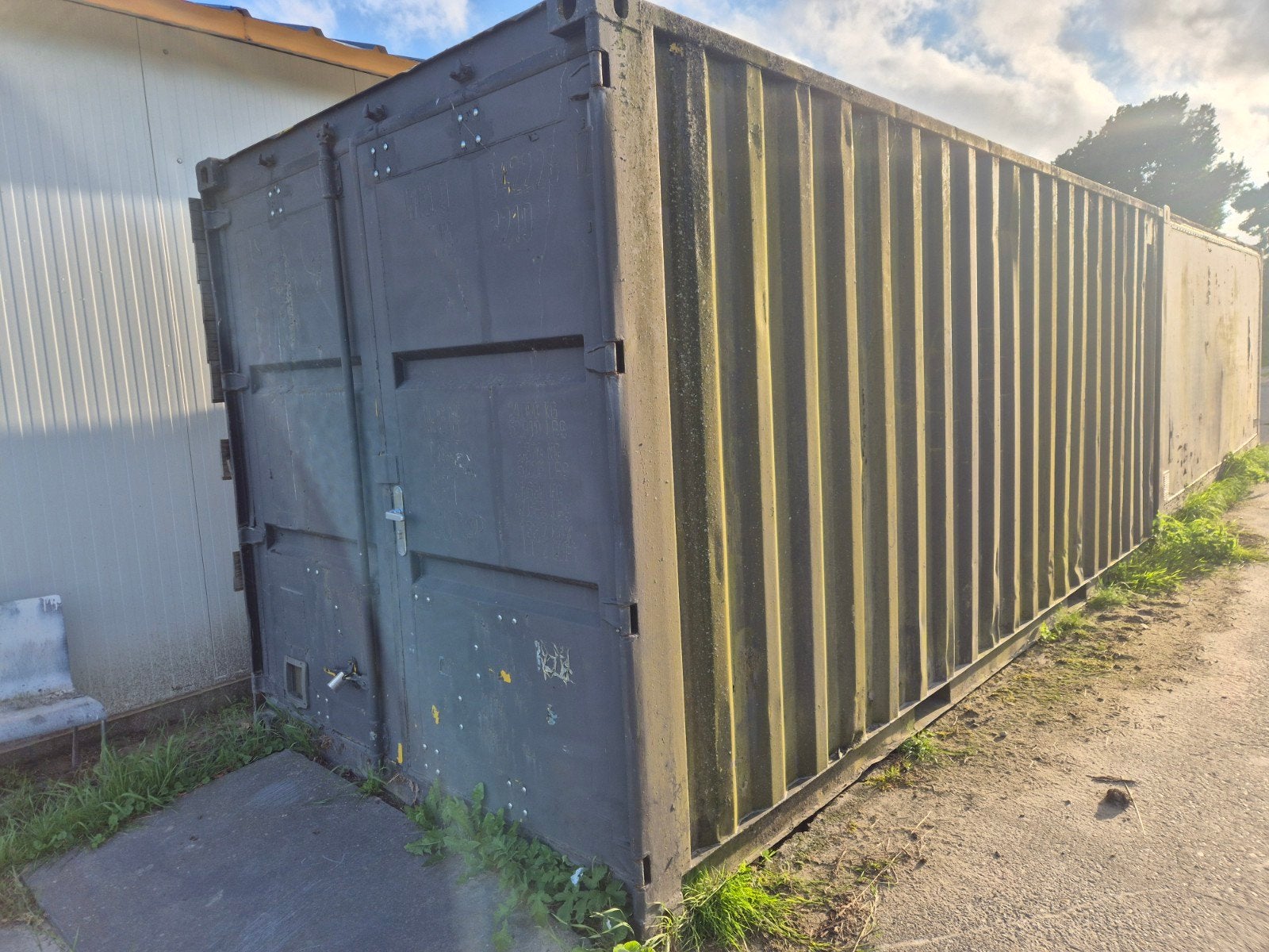 20ft 6 meter zeecontainer met stellingen en werkbank, Ophalen