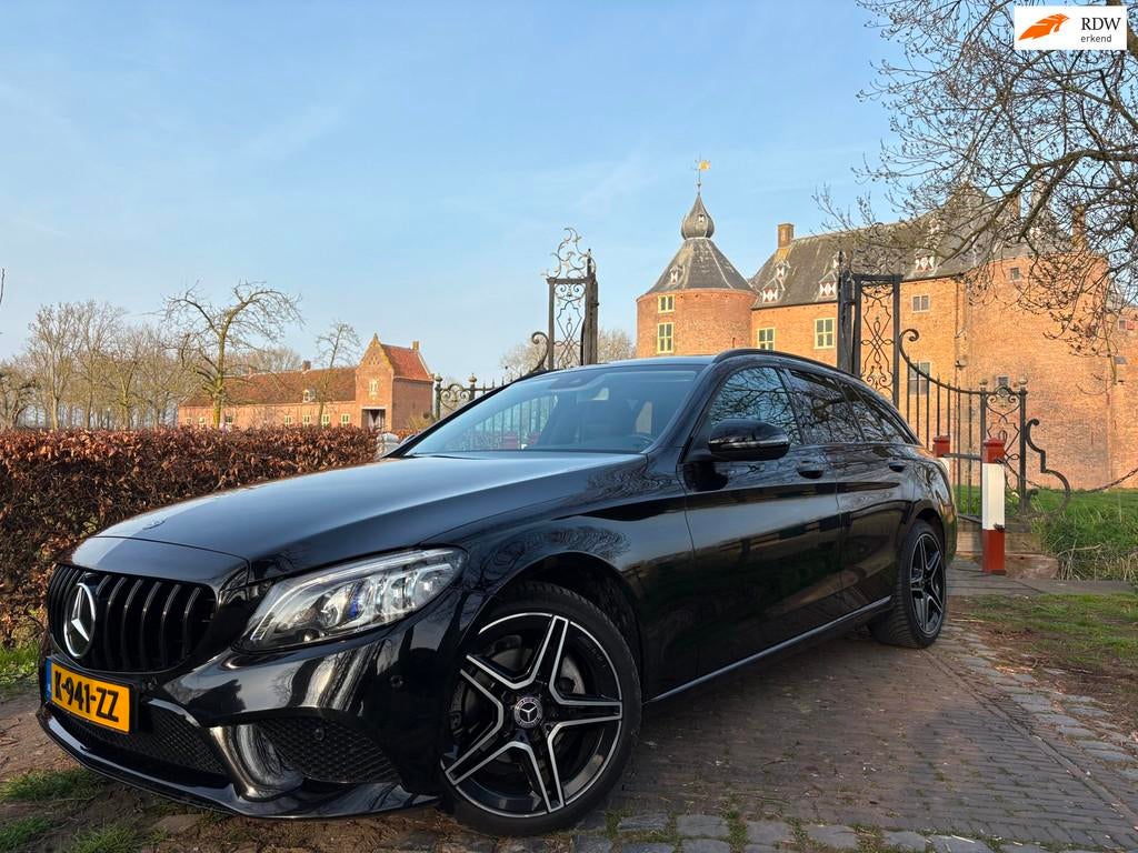 Mercedes-Benz C-klasse Estate 180 AMG/CARPLAY/NAVI/CRUIS/VOL, Automaat, Leder en Stof, Zwart, 14 km/l