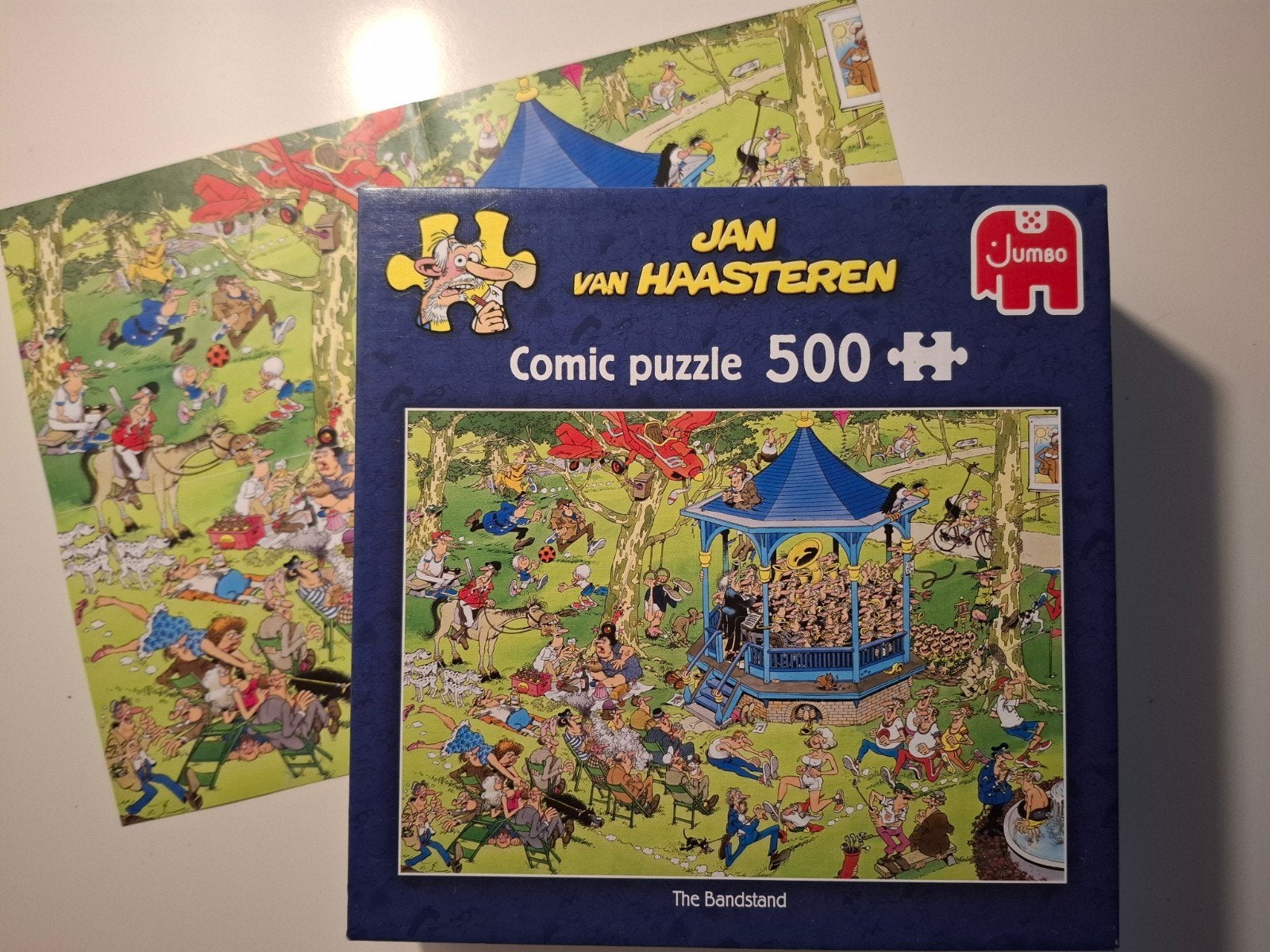 Jan van Haasteren 'The Bandstand' 500 stukjes + poster zgan, Ophalen of Verzenden, 500 t/m 1500 stukjes, Nieuw, Legpuzzel