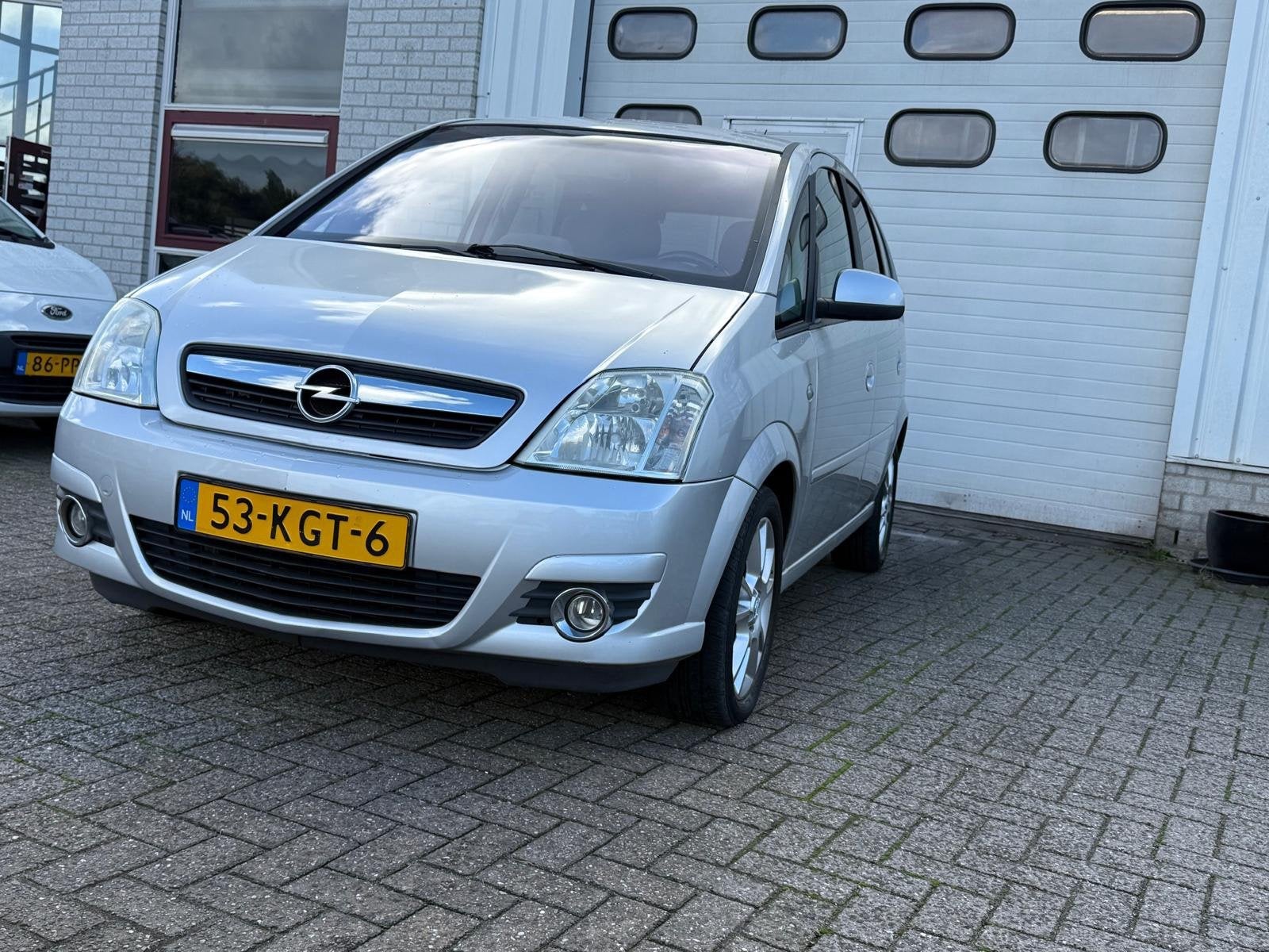 Opel Meriva 1.6-16V Cosmo, Auto's, 15 km/l, Gebruikt, 4 cilinders, Leder en Stof