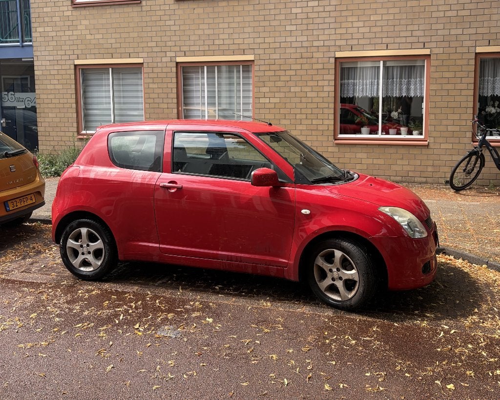 Suzuki Swift 1.3 3D 2006 Rood, Auto's, Suzuki, Stof, Swift, Origineel Nederlands, Handgeschakeld