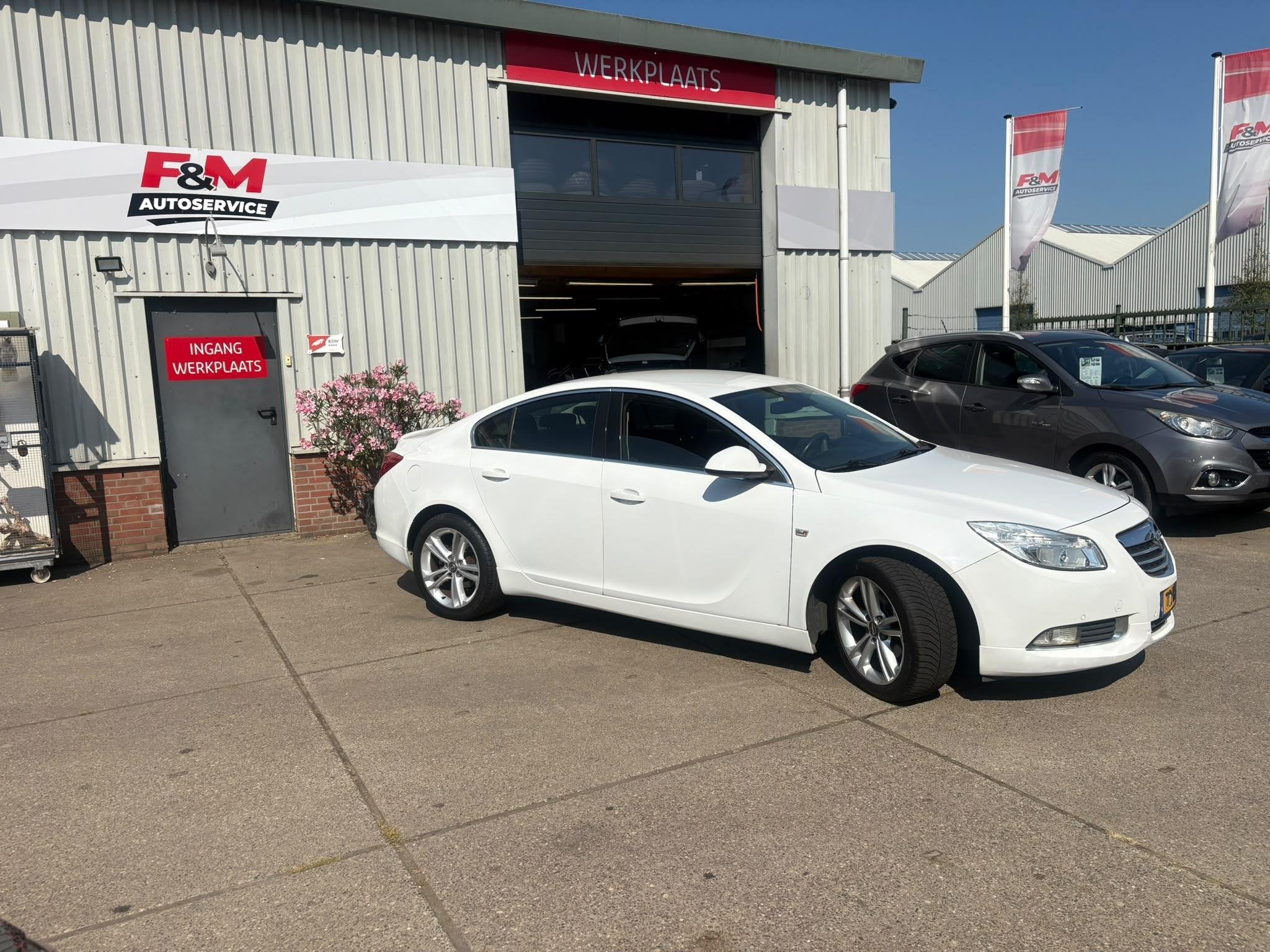 Opel Insignia 1.8 Edition Airco, cruise, pdc, navi, Auto's, Euro 5, Stof, Gebruikt, Zwart