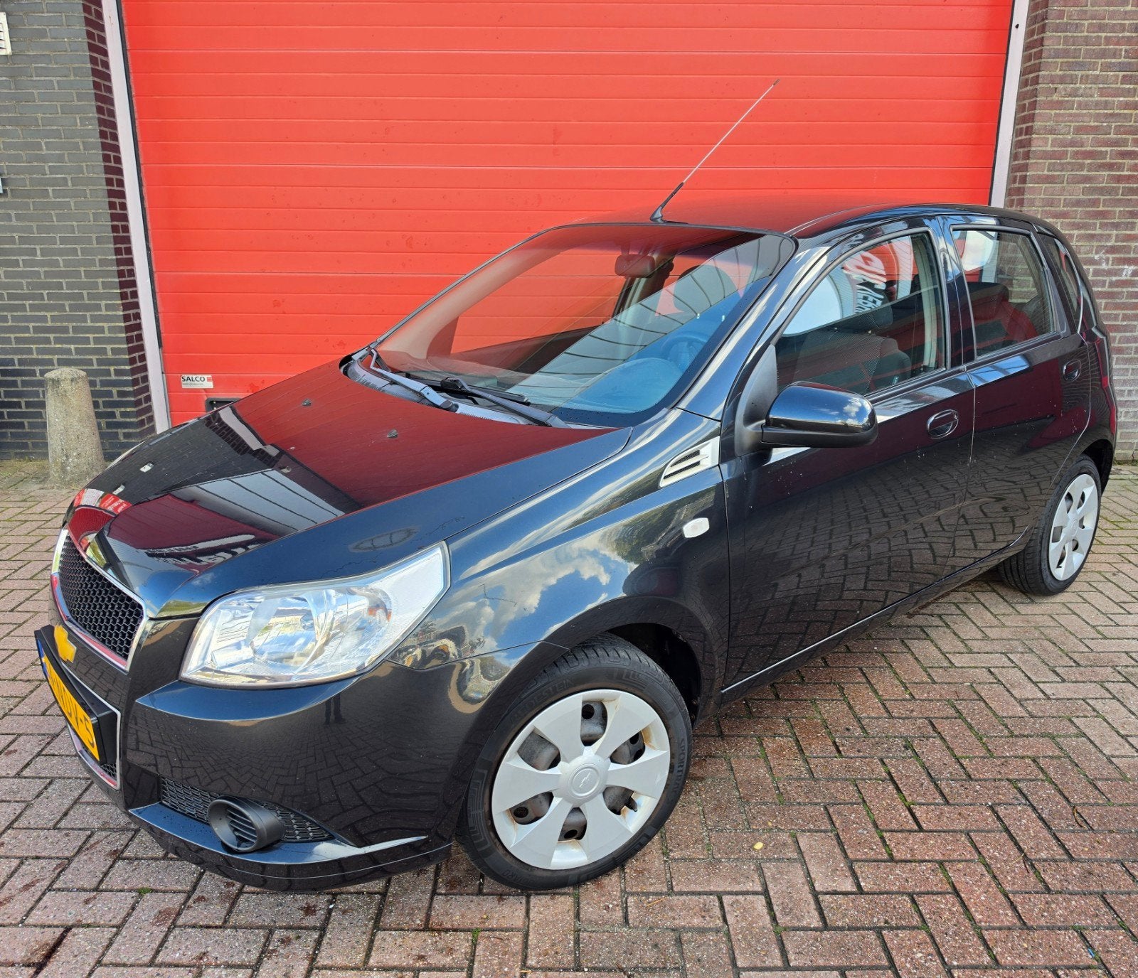 Chevrolet Aveo 1.2 16V 5D 2010 Zwart nieuwe apk, Voorwielaandrijving, 40 €/maand, Aveo, 4 cilinders