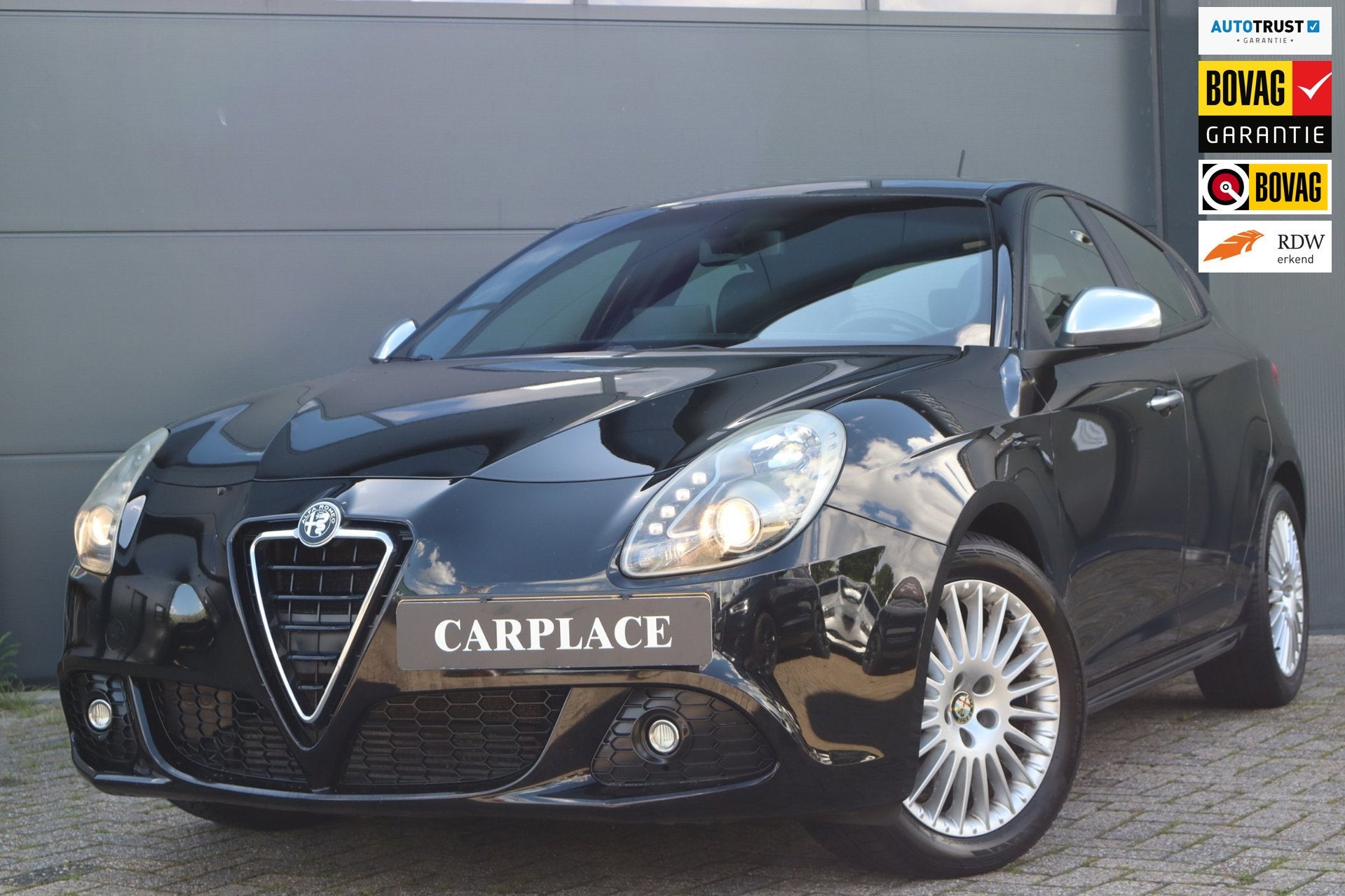Alfa Romeo Giulietta 1.4 T Distinctive-Automaat-Clima, Auto's, Alfa Romeo, Euro 5, Zwart, 4 cilinders, Zwart