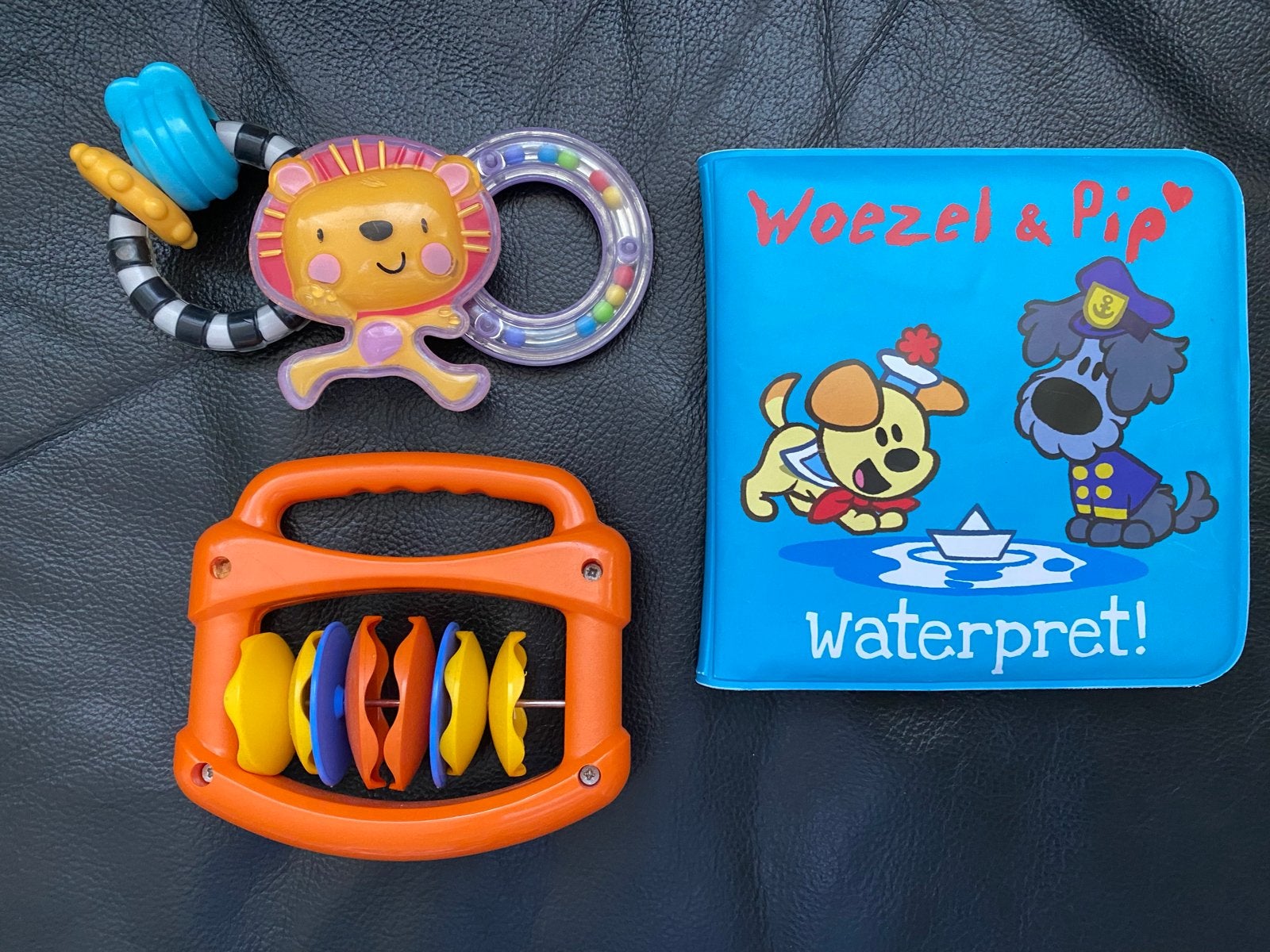 Rammelaars en Woezel & Pip waterboekje, Ophalen of Verzenden, Zo goed als nieuw, Rammelaar, Met geluid