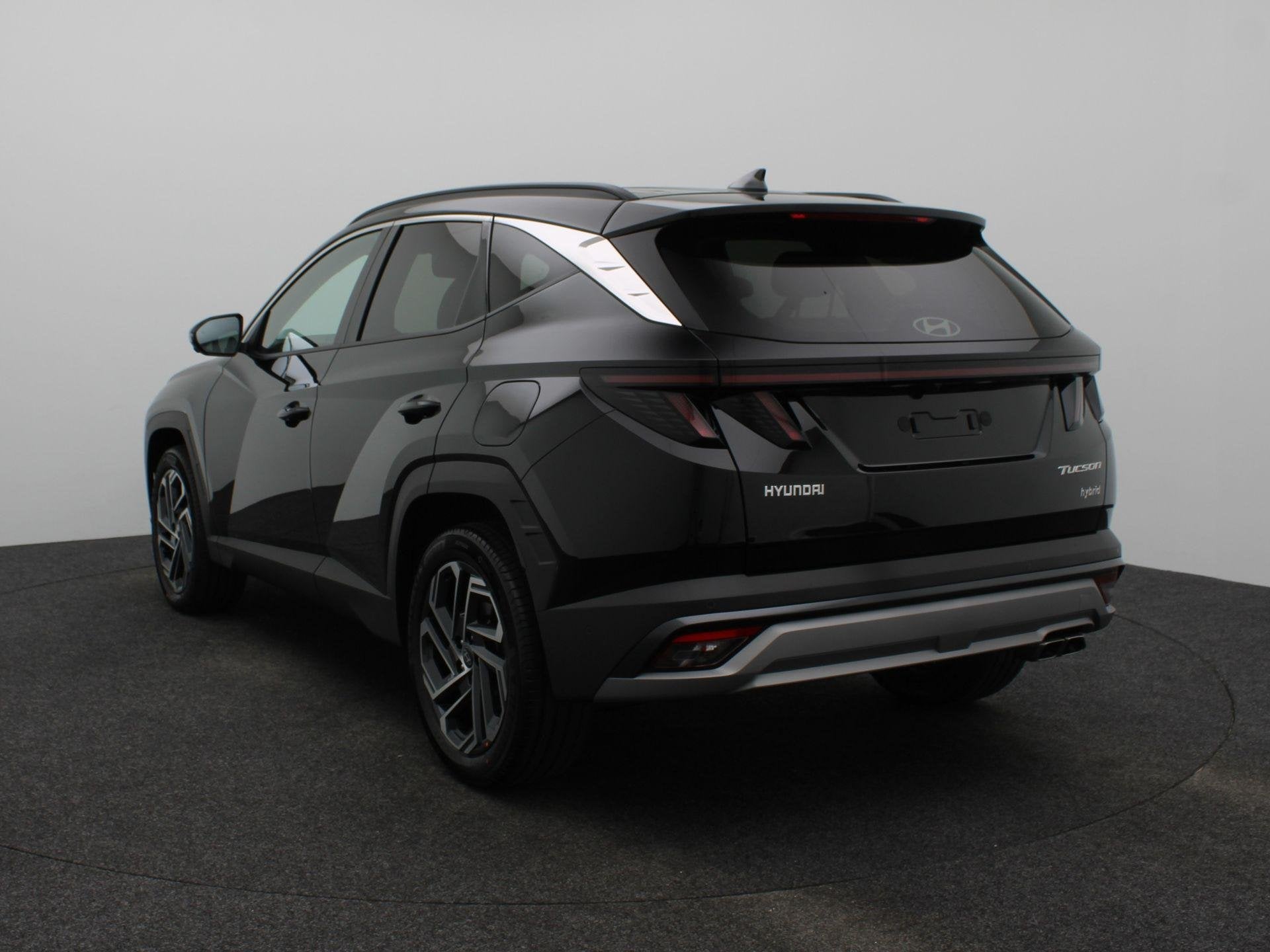 Hyundai Tucson 1.6 T-GDI HEV Premium | Stoel + stuurverwarmi, Auto's, 4 cilinders, Zwart, Leder, Bedrijf