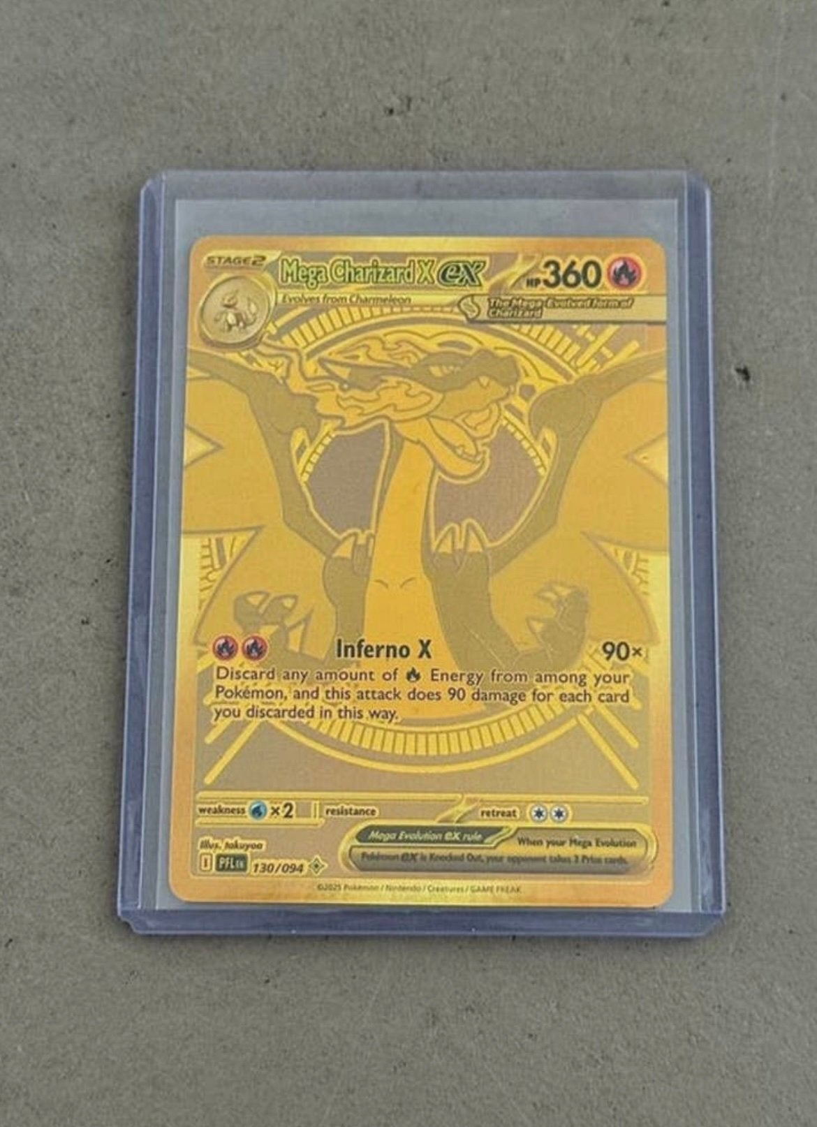 Golden Mega Charizard, Hobby en Vrije tijd, Verzamelkaartspellen | Pokémon, Ophalen of Verzenden, Zo goed als nieuw