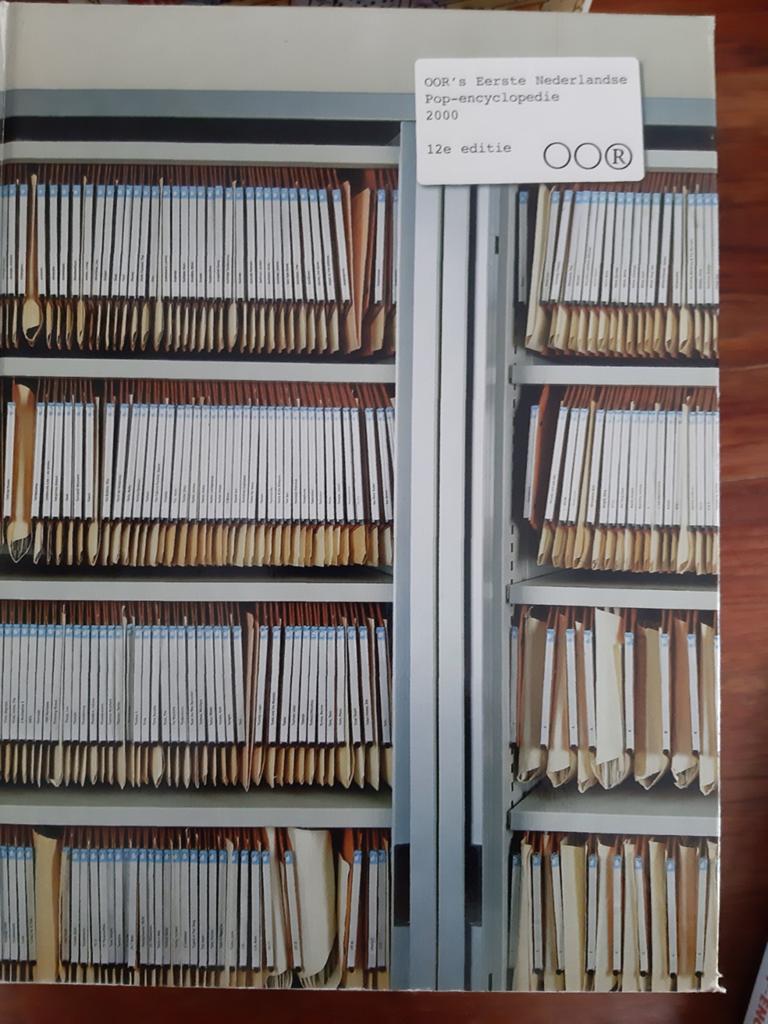OOR's Eerste Nederlandse Pop-encyclopedie 2000, Ophalen of Verzenden, Zo goed als nieuw, Overige onderwerpen, Los deel