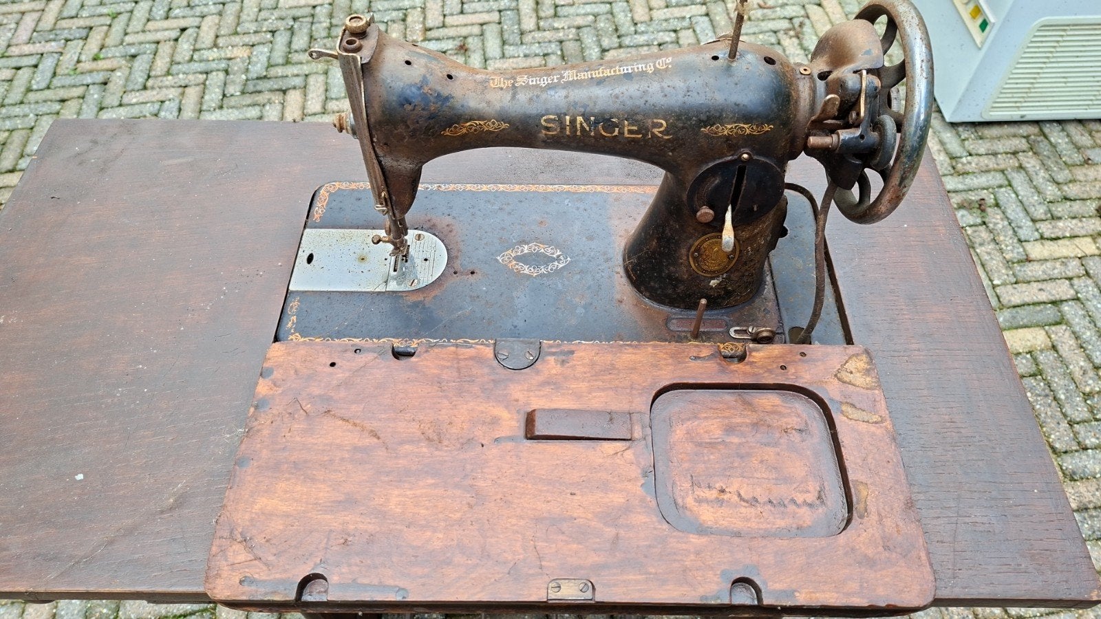 singer naaimachine, Ophalen