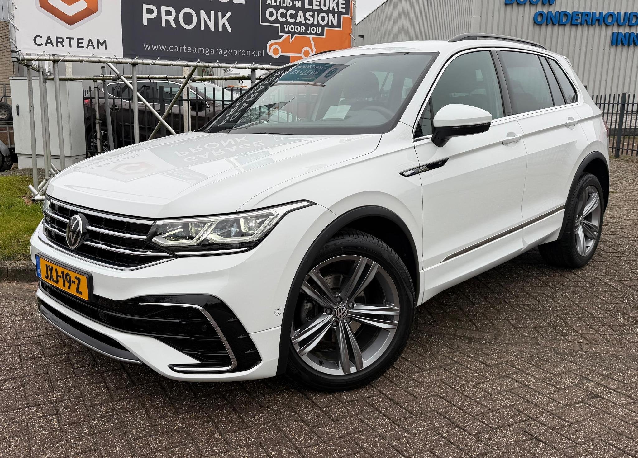 Volkswagen Tiguan 1.5 TSI 2X R-Line BOVAG GARANTIE CARPLAY/N, Auto's, Stof, Euro 6, 4 cilinders, Automatische klimaatregeling