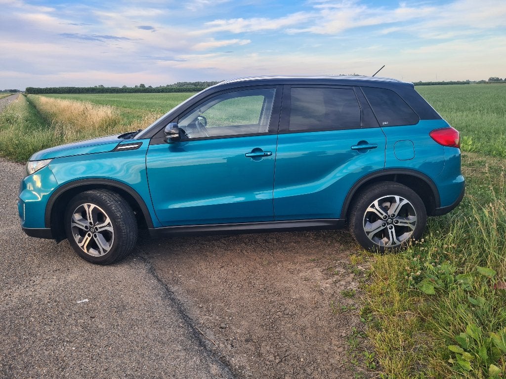 Suzuki Vitara 1.6 VVT 120pk 2WD 2015 Blauw, Auto's, Suzuki, Voorwielaandrijving, 40 €/maand, Zwart, 4 cilinders