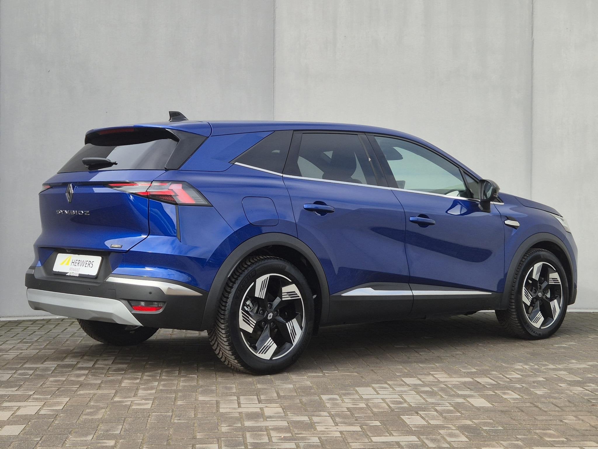 Renault Symbioz 1.6 E-Tech full hybrid 145 iconic Automaat /, Auto's, 745 kg, Gebruikt, Blauw, Leder