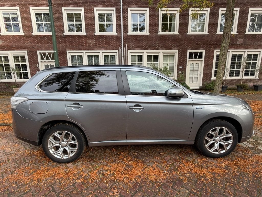 Mitsubishi Outlander 2.0 Dohc Mivec Phev 203pk 4WD CVT 5P, Auto's, Stof, Outlander, Zwart, 4 cilinders
