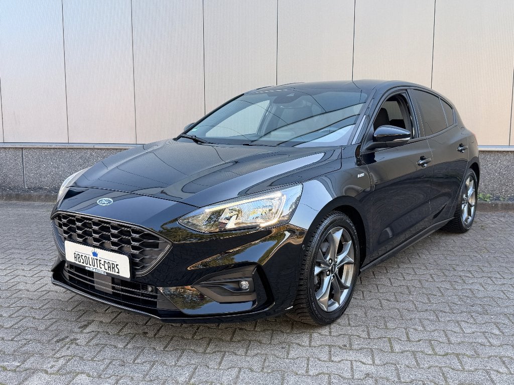 Ford Focus ST-Line 1.5 EcoBoost Cam|PDC|Navi|Clima|CarPlay, 1304 kg, Stof, 150 pk, Zwart