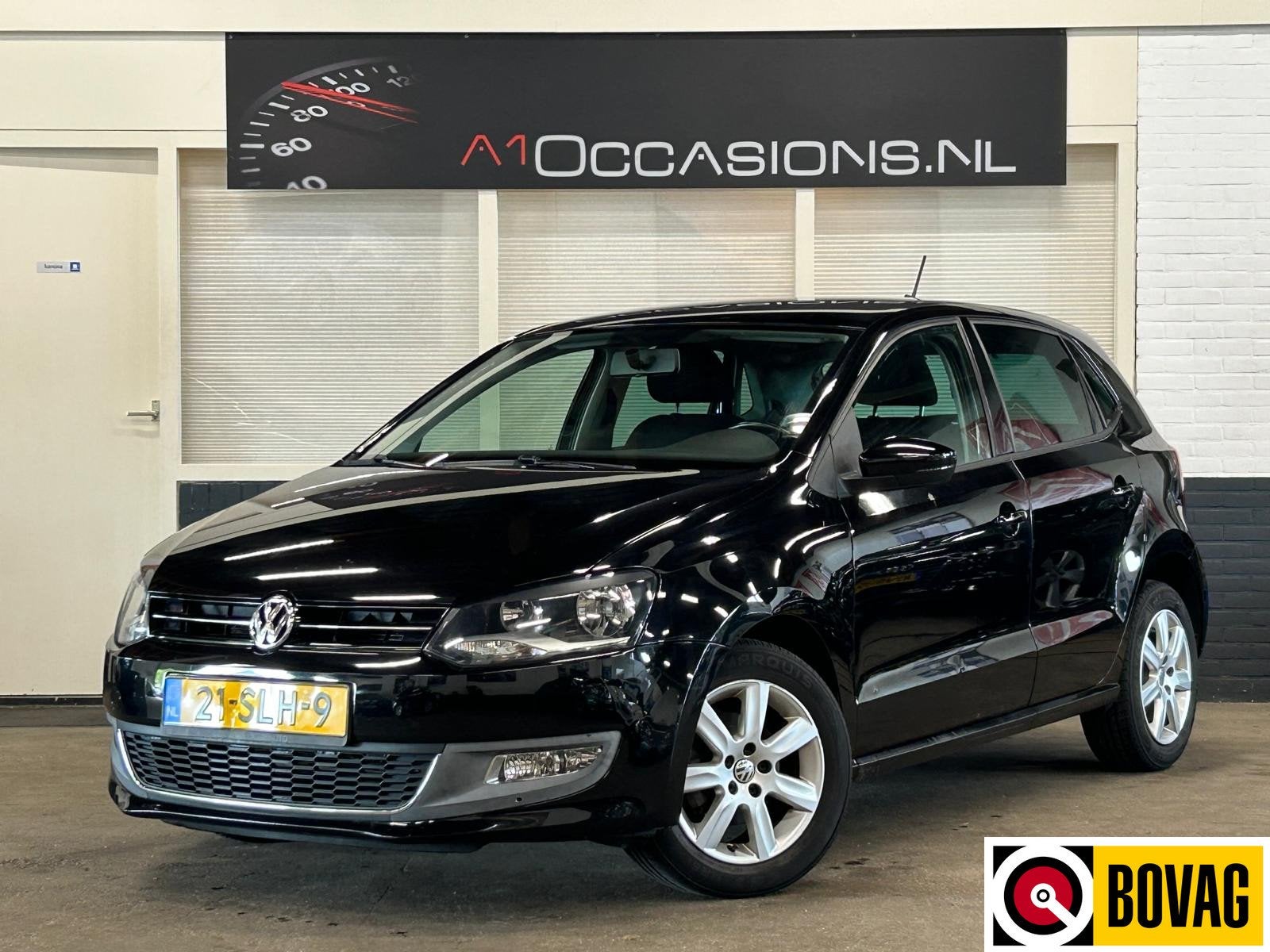 Volkswagen Polo 1.2 TSI Highline + NAVI (bj 2011), Euro 5, Stof, Zwart, Zwart