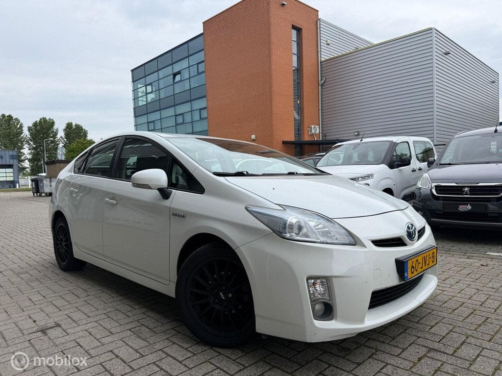 Toyota Prius 1.8 Hybride Automaat, Auto's, Toyota, 136 pk, Gebruikt, 4 cilinders, Wit