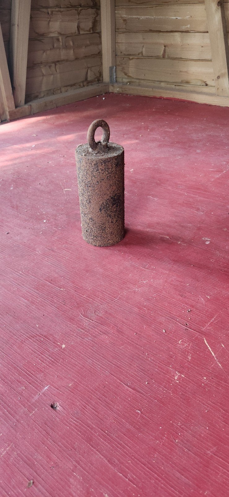 Oud gietijzeren gewicht met ring, Ophalen
