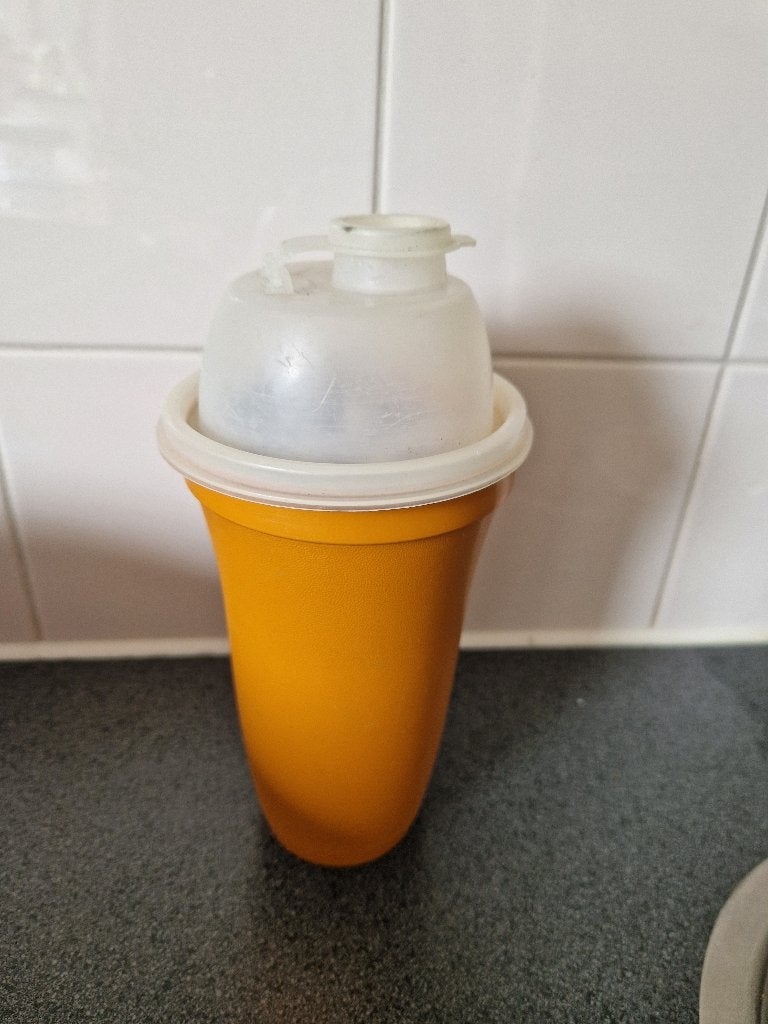 Vintage Tupperware slagroomklopper in de kleur oranje., Ophalen of Verzenden, Gebruikt, Oranje, Overige typen