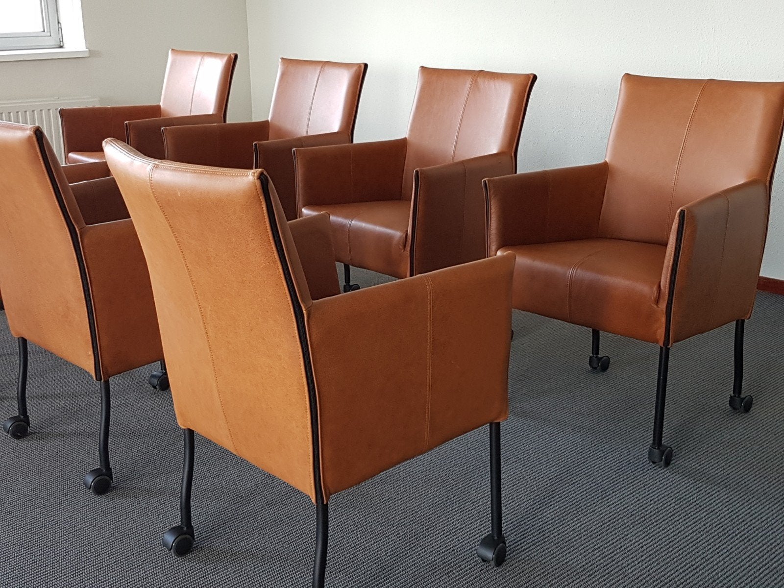 8 Comfortabele Design eetkamerstoelen Bruin Leer, wielen, Huis en Inrichting, Stoelen, Bruin, Geraldine charly chaplin montis gelderland goossens stijl