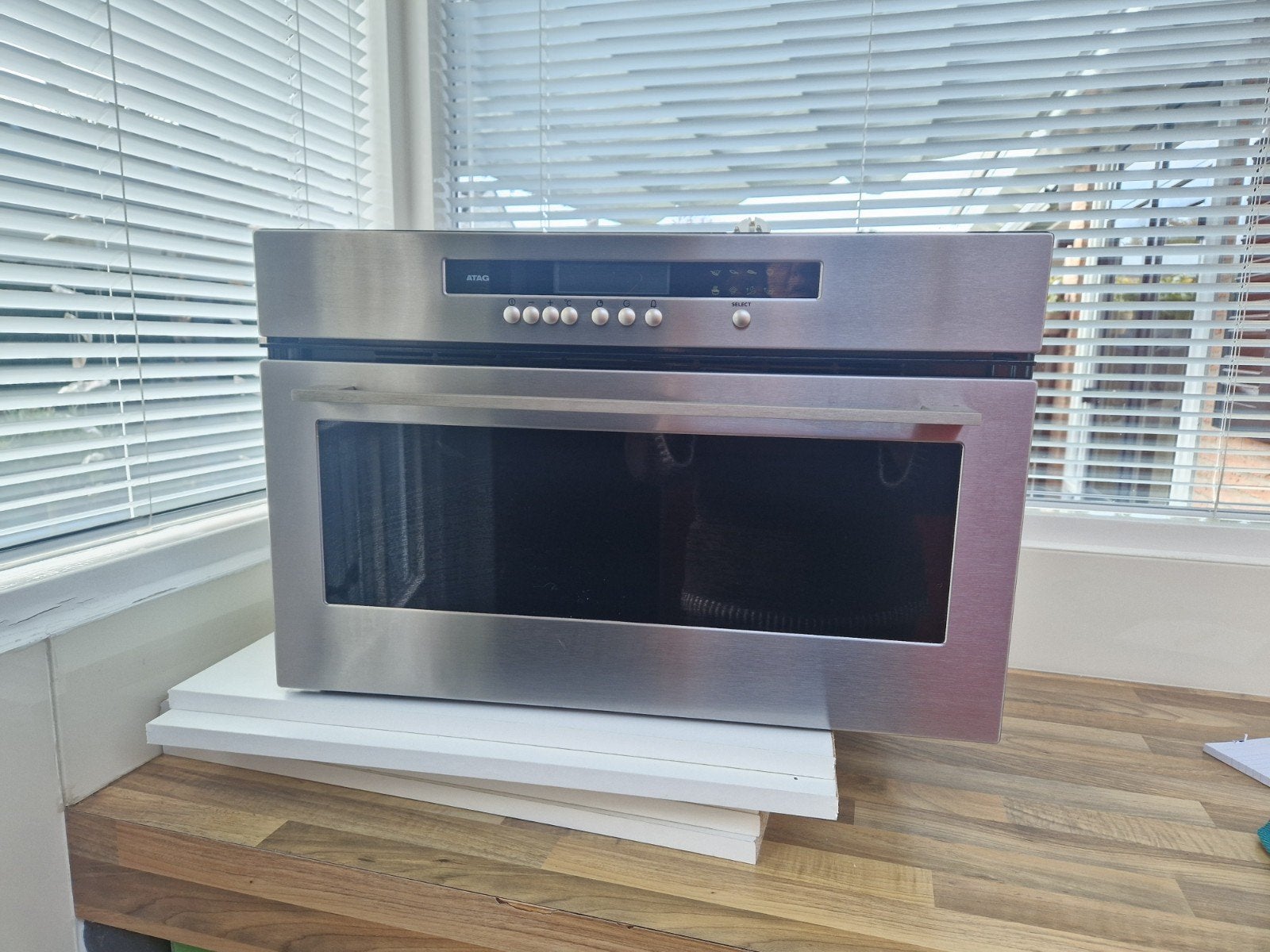 atag stoomoven, Ophalen