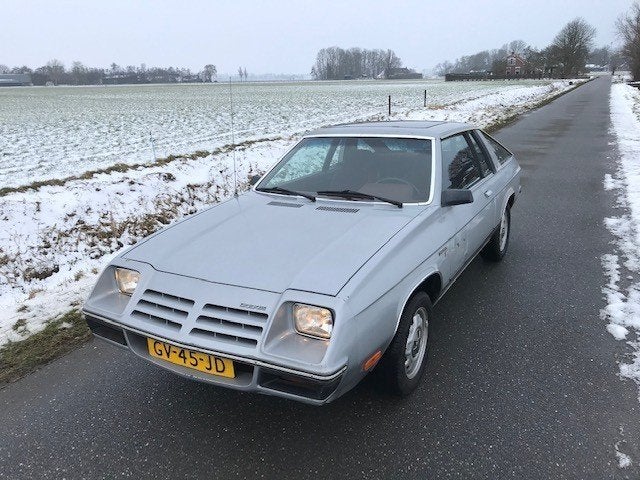 Dodge Omni 024  2.2 1981 Grijs apk 2028, Auto's, Voorwielaandrijving, Stof, Open dak, Overige kleuren