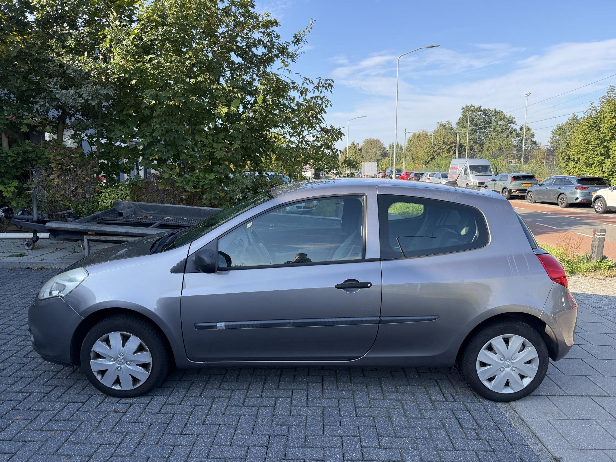 Renault Clio 1.2 Special Line | Navi | Airco | Volledig Onde, Auto's, Voorwielaandrijving, Gebruikt, Zwart, 4 cilinders