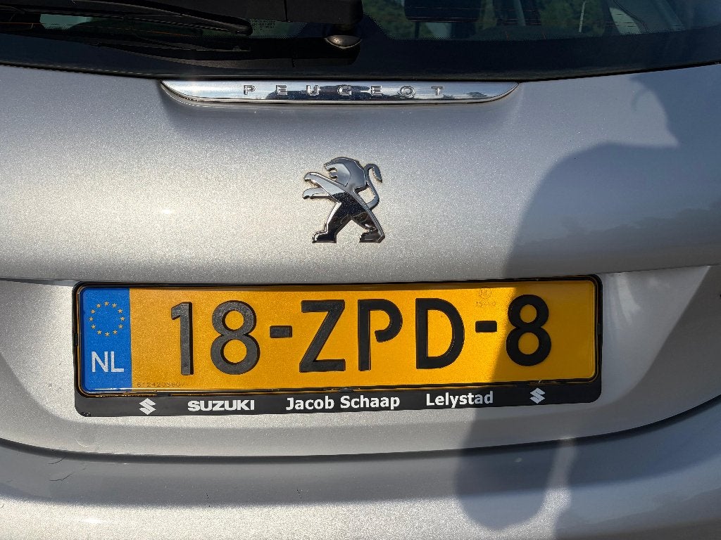 Foto 8 van Peugeot 208 1.2 VTi 82PK 5D 2013 - Grijs / Zilver