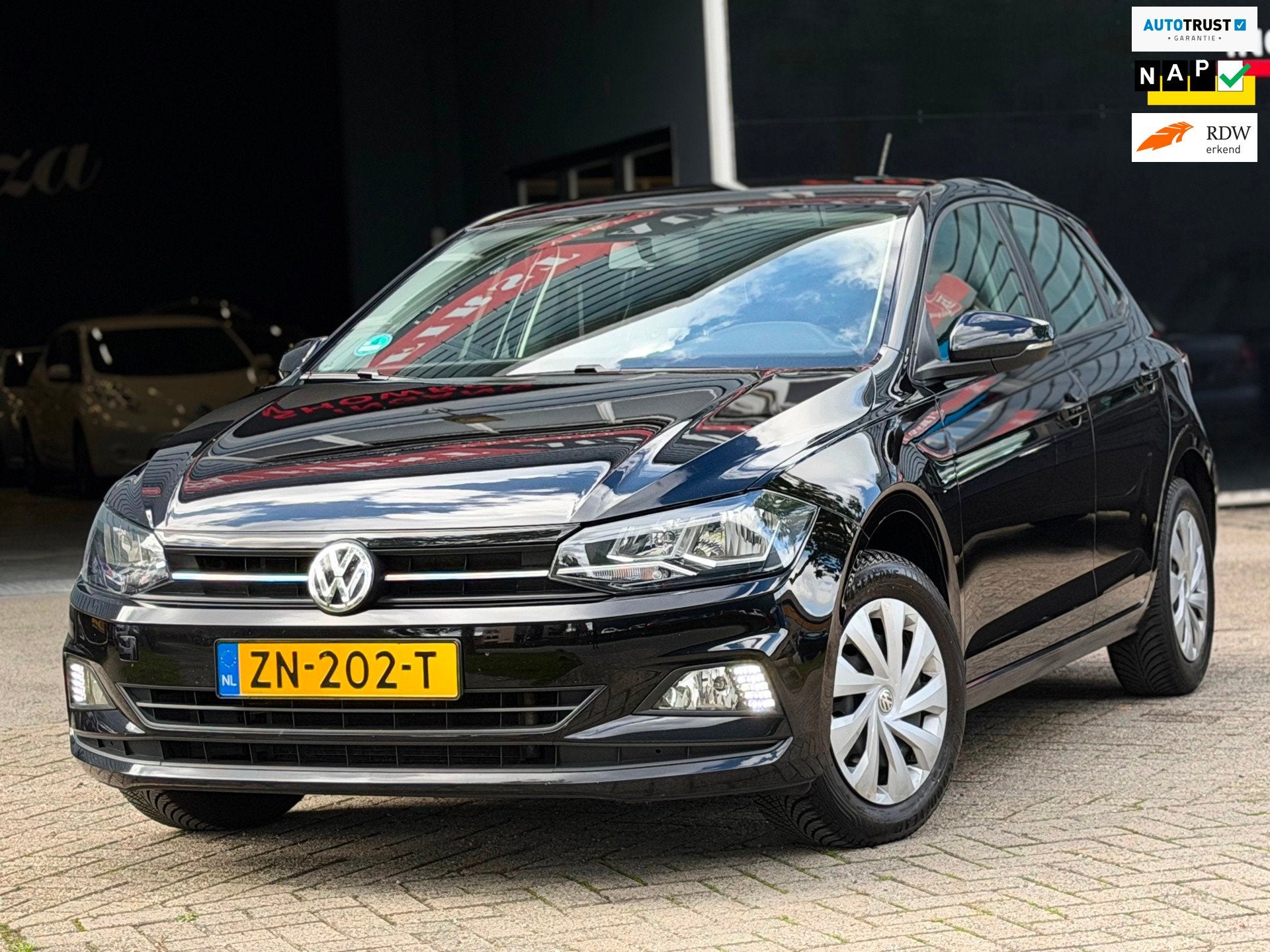 Volkswagen Polo 1.0 TSI Comfortline 5-DEURS CARPLAY/NAVI/CRU, Dealer onderhouden, Stof, Met garantie (alle), Zwart