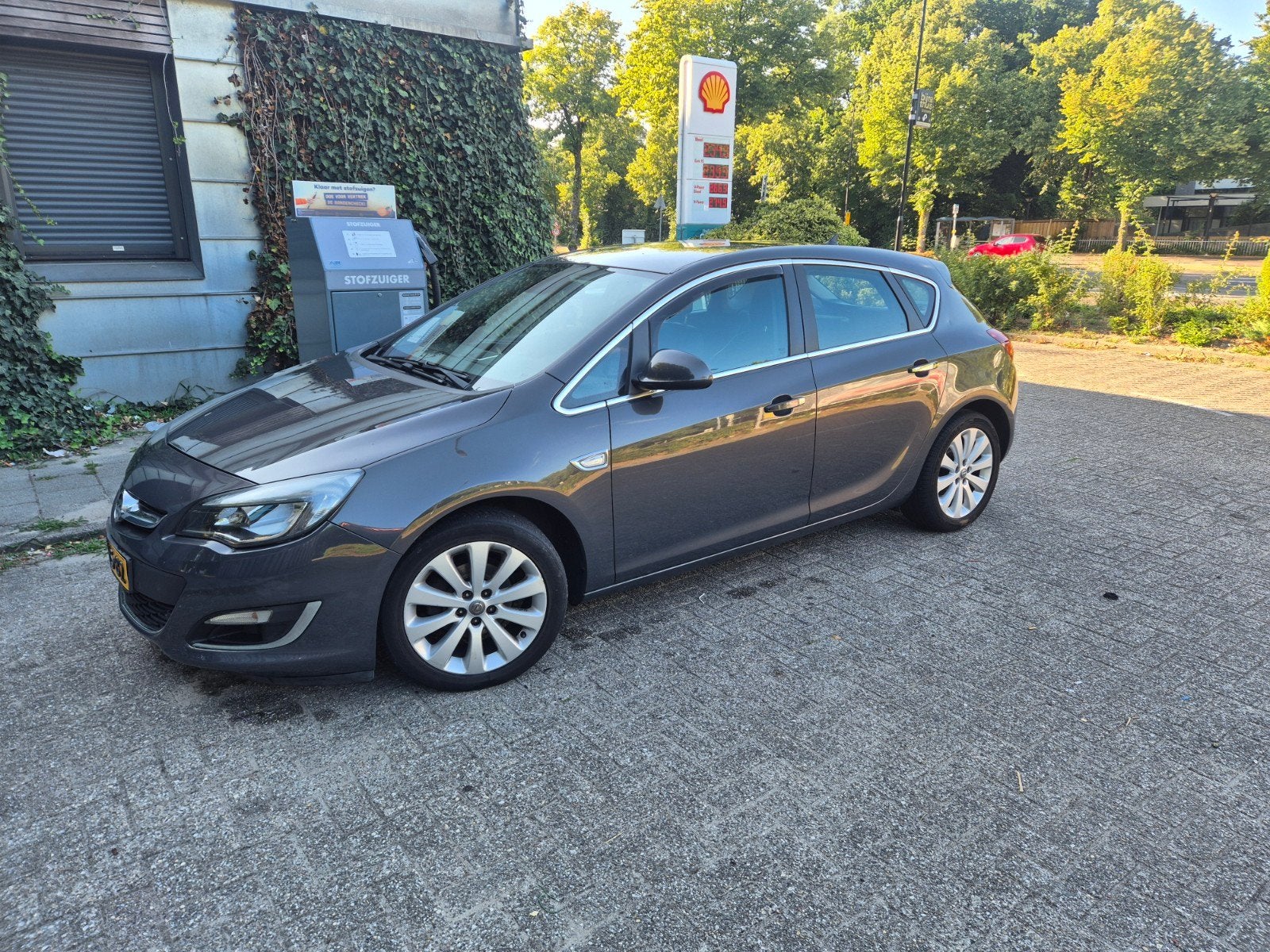 Opel Astra 1.4 Turbo 103KW 5D AUT 2012 Grijs, Auto's, 15 km/l, 680 kg, 4 cilinders, 1353 kg
