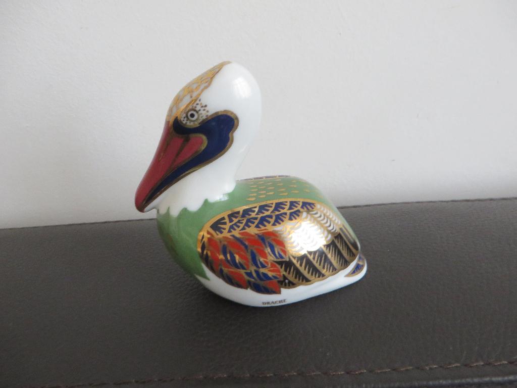 Pelikaan, beeldje van porselein, meer kleurig, goud, Duits, Ophalen of Verzenden