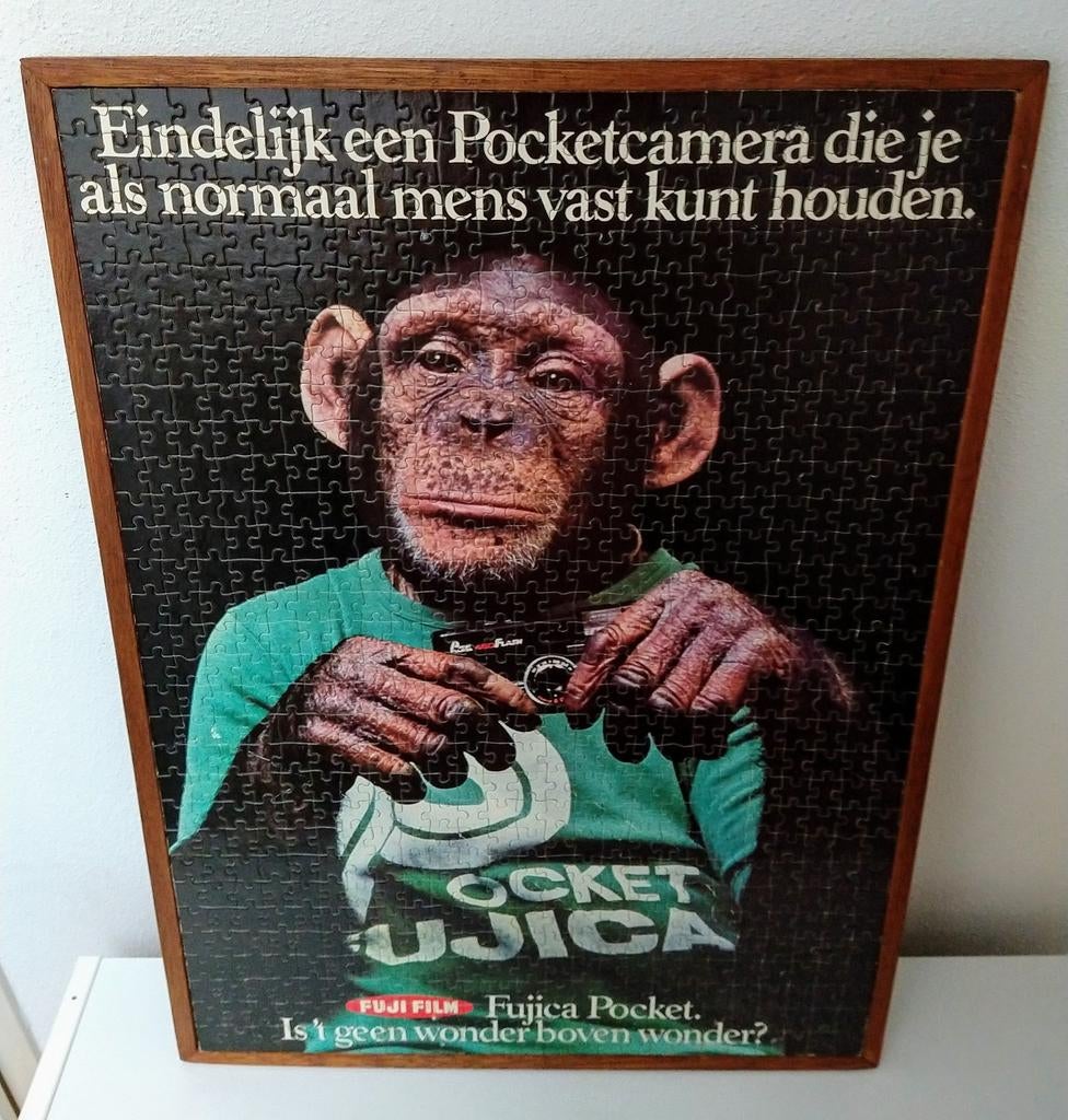 Reclame advertentie Fuji Fujica chimp puzzelvorm + lijst , Verzamelen, Ophalen, Gebruikt, Gebruiksvoorwerp