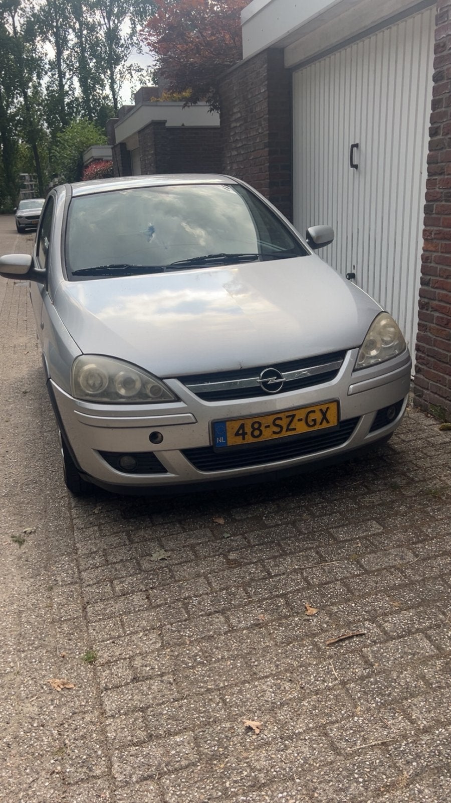 Opel Corsa 1.2 16V Twinport 3D 2006 Grijs, Ophalen, Gebruikt
