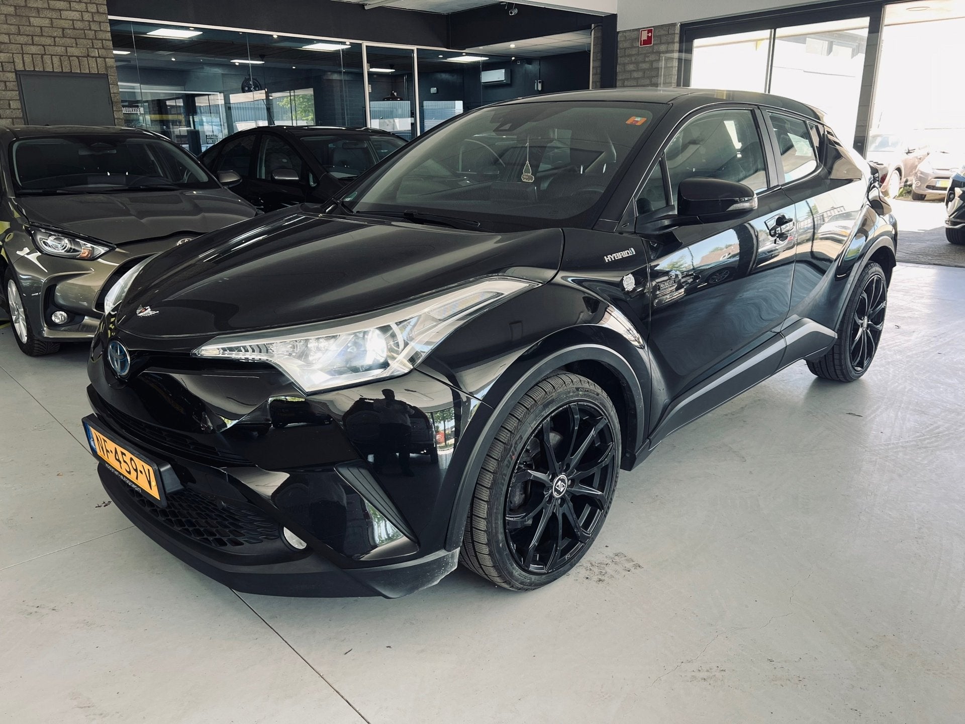 Toyota C-HR 1.8 Hybrid Dynamic NAP, Auto's, Automatische klimaatregeling, Euro 6, 4 cilinders, Zwart