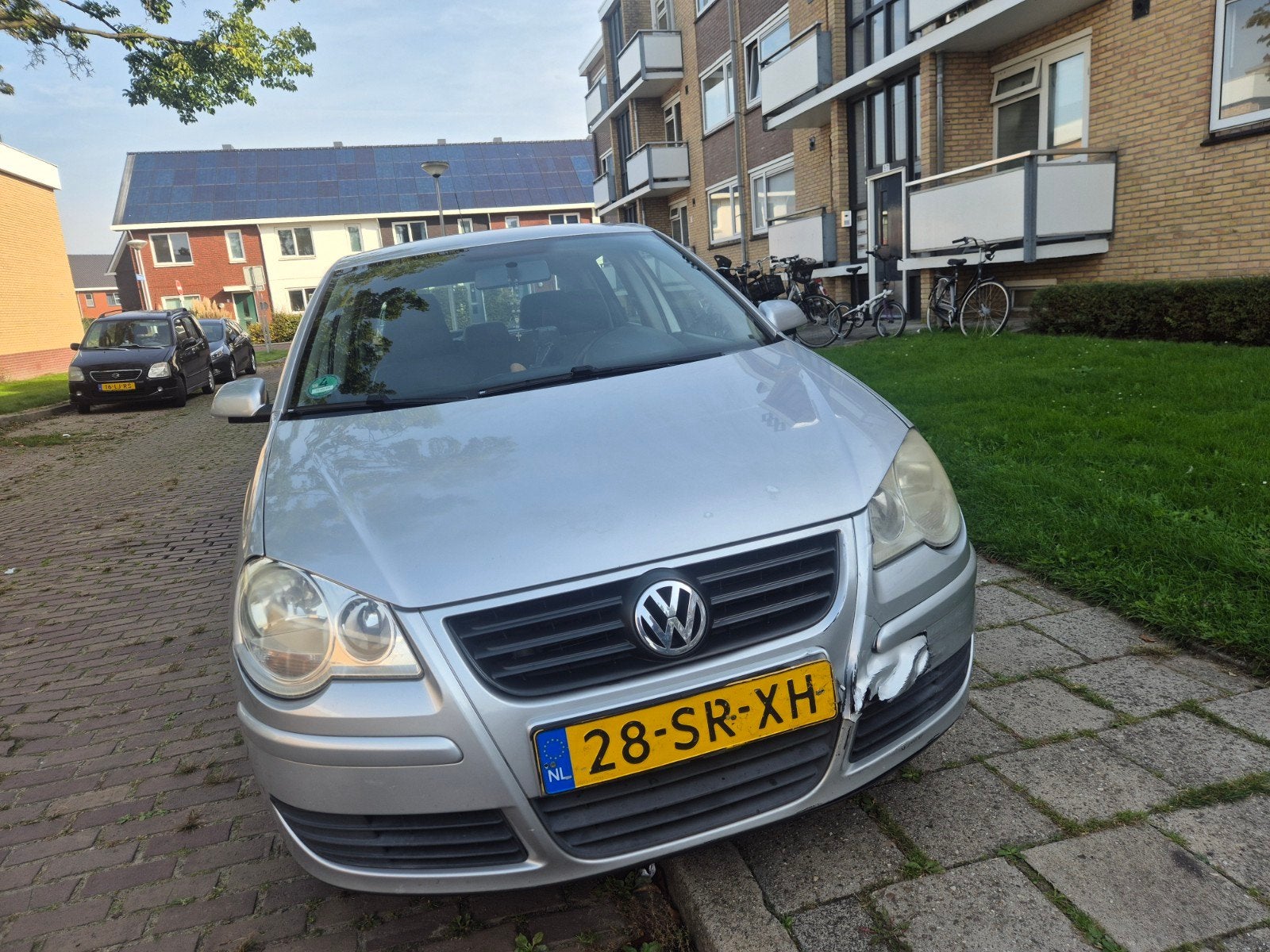 Volkswagen Polo 1.4 55KW AUT 2006 Grijs, Auto's, Stof, Zwart, 4 cilinders, Origineel Nederlands