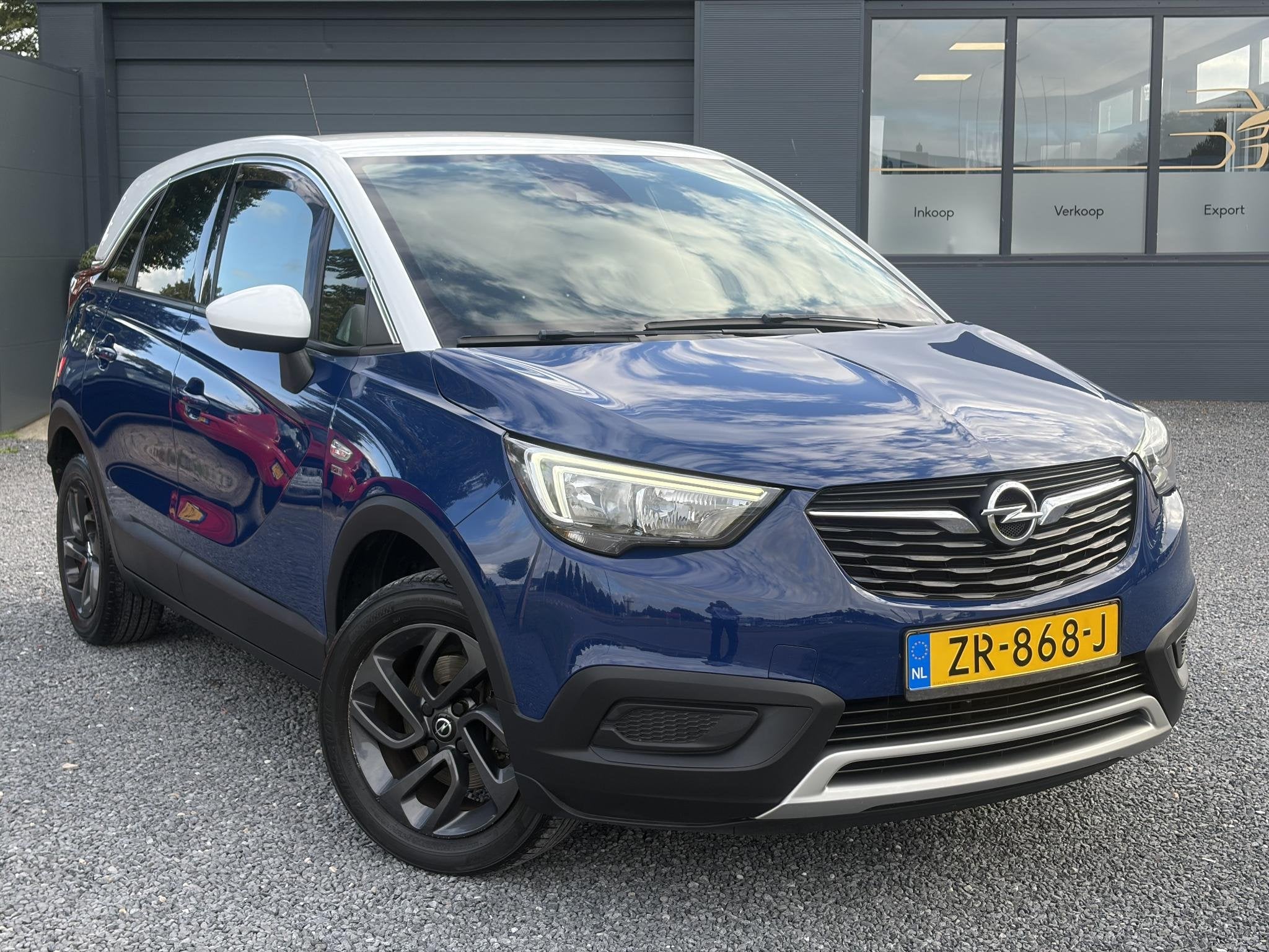 Opel Crossland X 1.2 Turbo 120 Jaar Edition ✓110pk✓D-rie, Auto's, Voorwielaandrijving, Dealer onderhouden, Gebruikt, Blauw