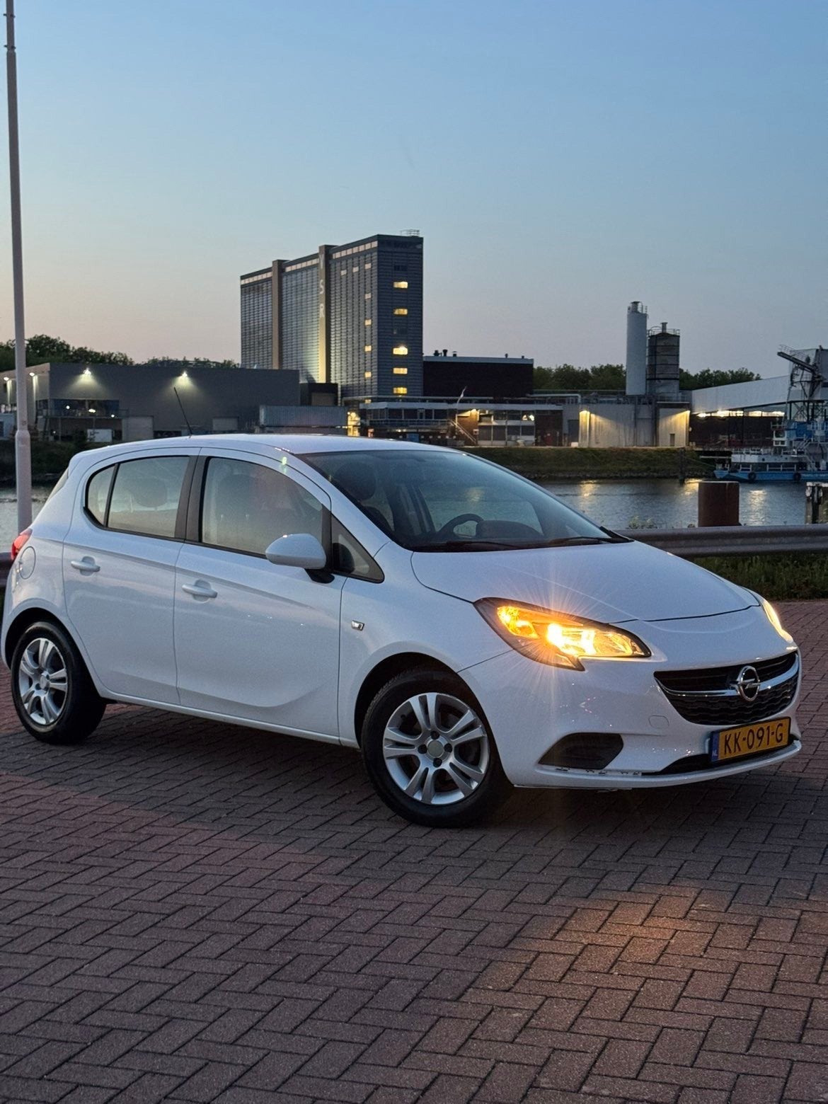 Opel Corsa 1.4 66KW/90PK 5D 2016 Wit, Auto's, Voorwielaandrijving, 1398 cc, 4 cilinders, Origineel Nederlands