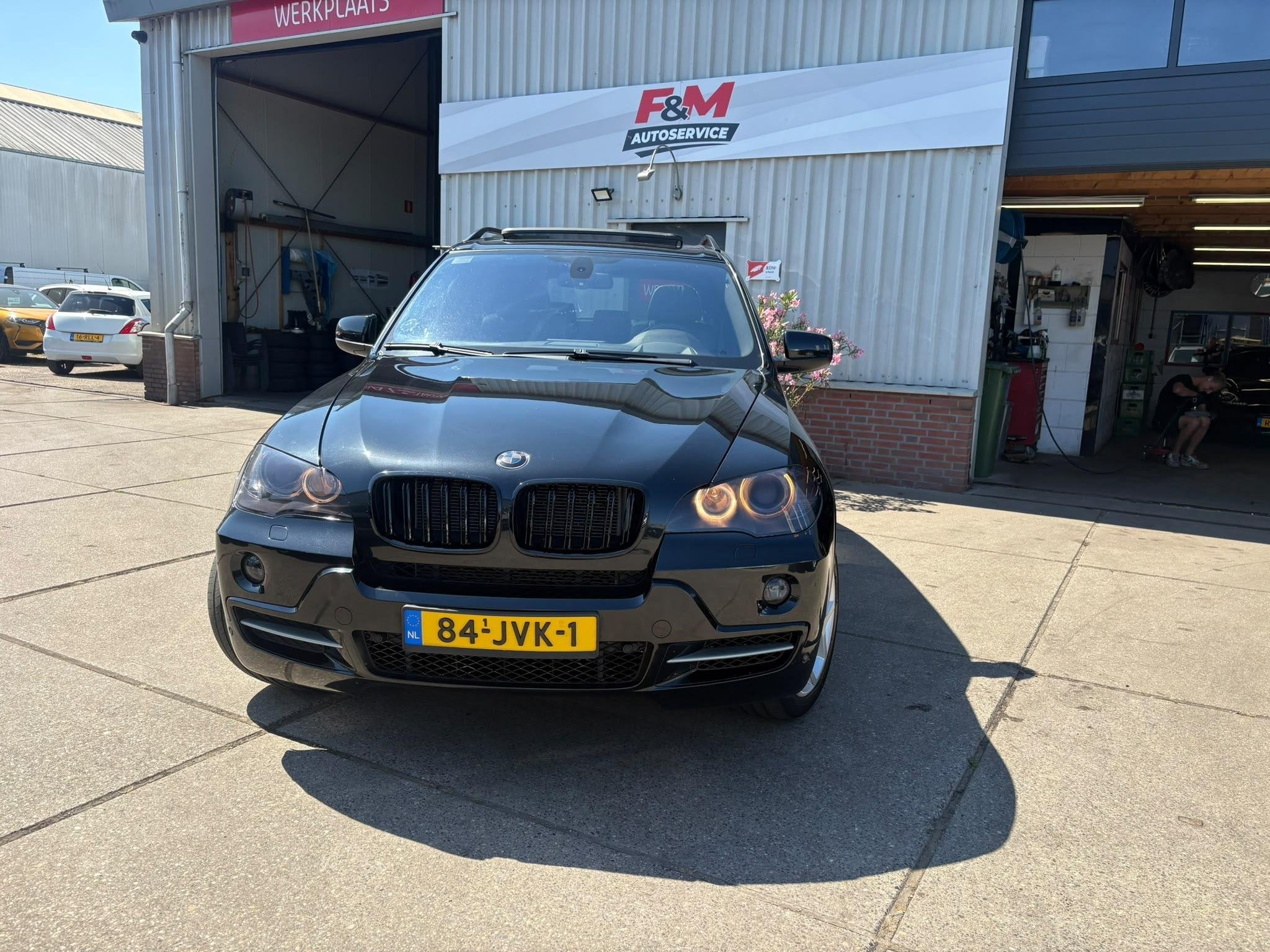 BMW X5 xDrive48i High Executive 7p, Clima, cruise, HUD, stoe, Automaat, Gebruikt, 138 €/maand, Zwart