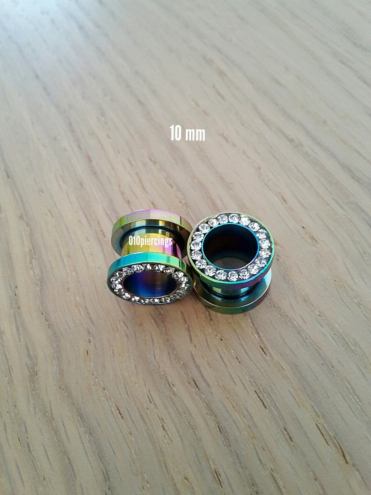 Nieuwe tunnels, pluggen. Staal. Regenboog. Steentjes., Sieraden, Tassen en Uiterlijk, Piercings, Ophalen of Verzenden, Zo goed als nieuw