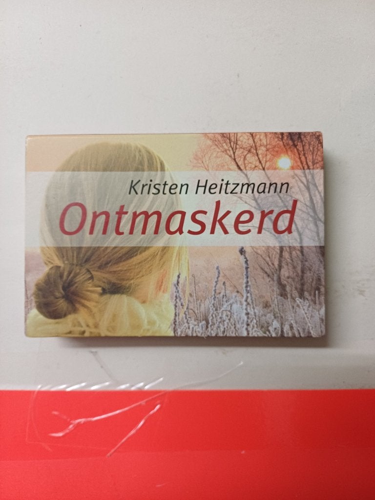 Dwarsligger nr 236 - Kristen Heitzmann - Ontmaskerd, Boeken, Ophalen of Verzenden, Gelezen