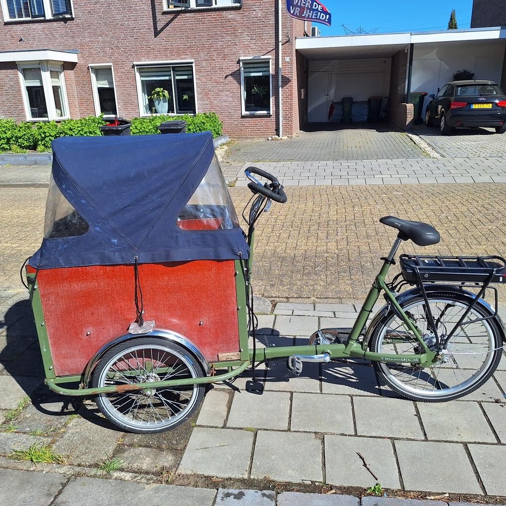 T Mannetje elektrische bakfiets met 4 zitplaatsen en zeil, 4 kinderen of meer, Gebruikt, Huif, Trommelrem