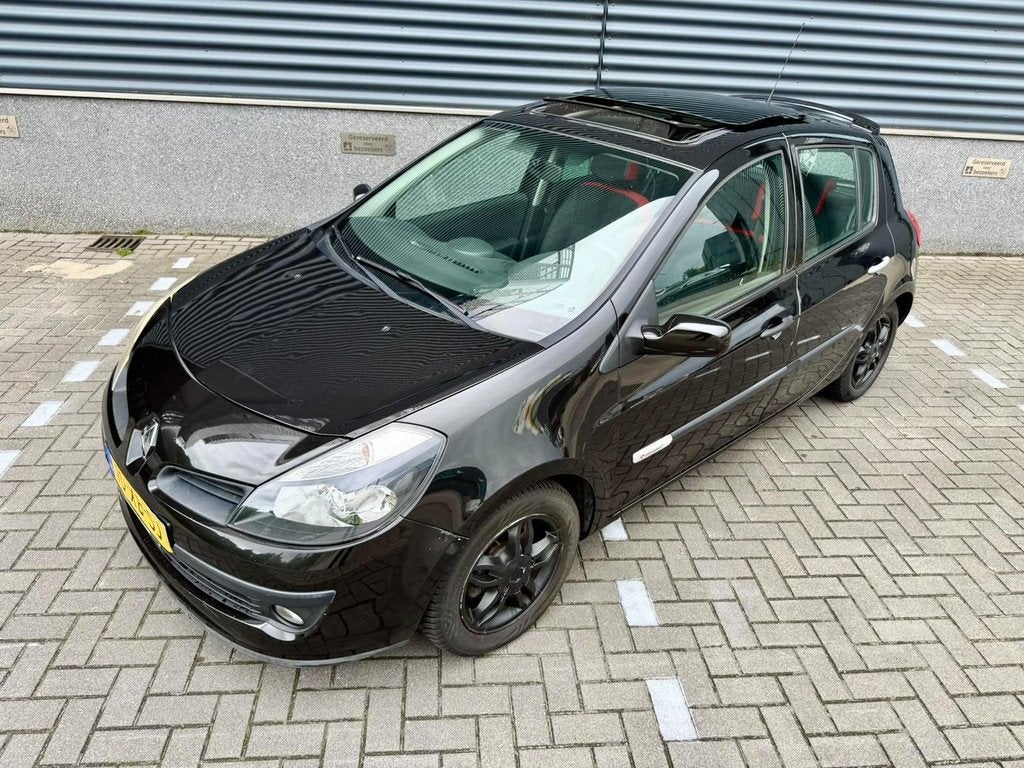 Renault Clio 1.4-16V Rip Curl *PANORAMADAK*AIRCO*100PK, Auto's, Renault, Voorwielaandrijving, Gebruikt, 4 cilinders, Zwart