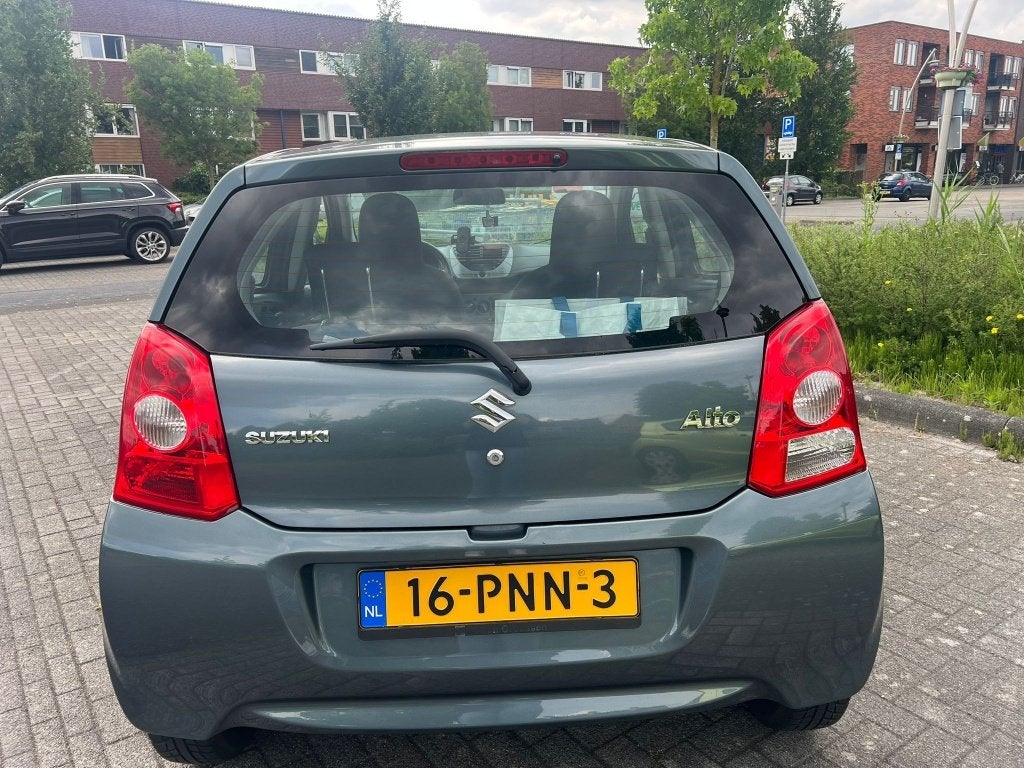 Suzuki Alto 1.0 2011 Grijs, Auto's, Voorwielaandrijving, Euro 5, Stof, 4 stoelen