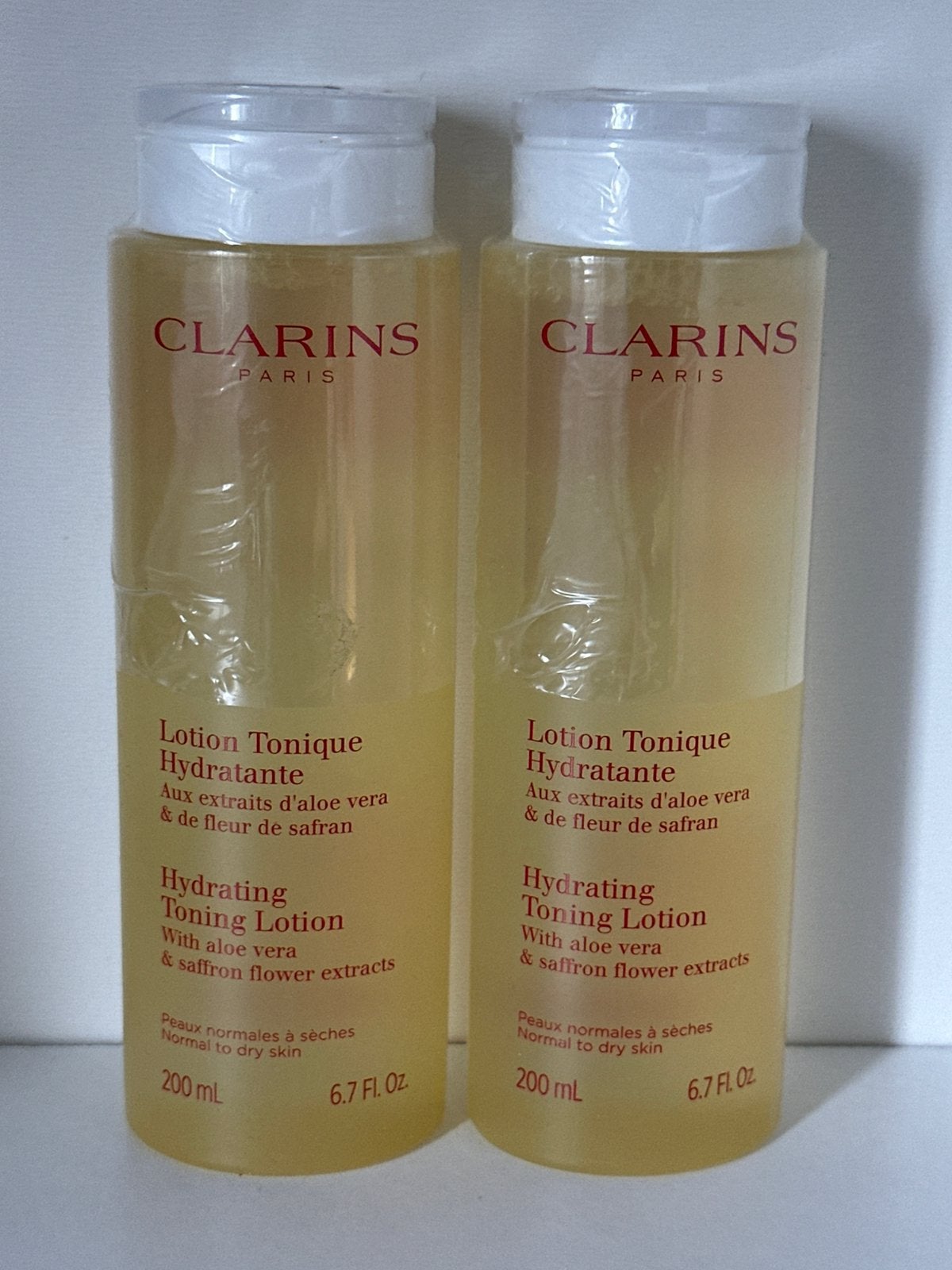 Clarins Hydrating Toning Lotion with Aloe Vera 200 ml, Sieraden, Tassen en Uiterlijk, Ophalen of Verzenden, Nieuw, Gehele gezicht