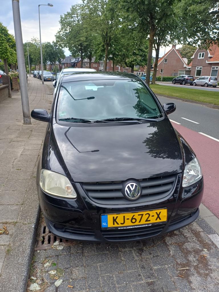 Volkswagen Fox 1.2 40KW 2006 Zwart, Auto's, Voorwielaandrijving, Stof, 4 stoelen, 1198 cc
