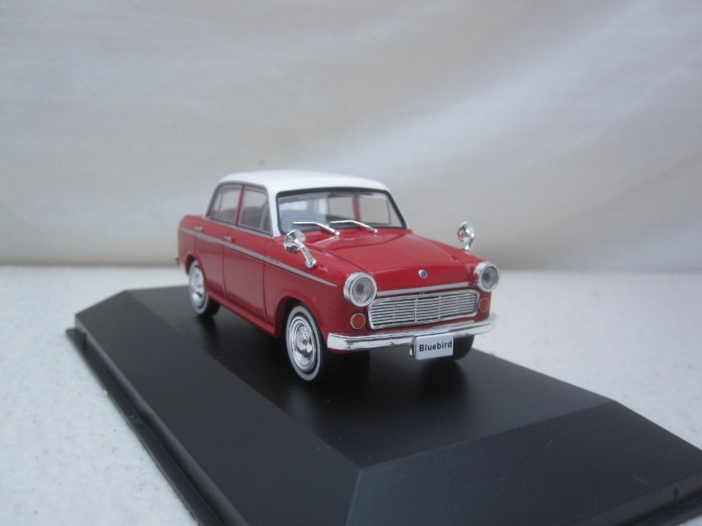 Datsun Bluebird 310 1959 rood 1:43 First43, Ophalen of Verzenden, Nieuw, Auto, Overige merken