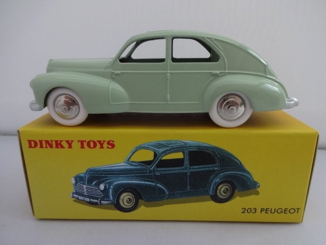 Peugeot 203 licht groen nr: 24R van Dinky Toys schaal 1:43, Hobby en Vrije tijd, Modelauto's | 1:43, Ophalen of Verzenden, Nieuw