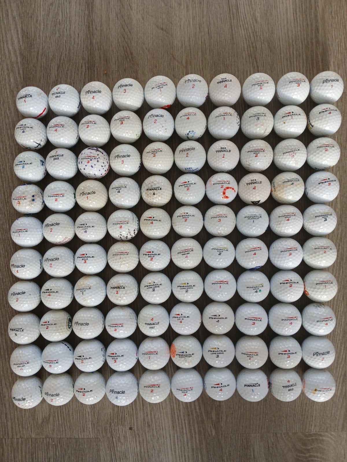 100 Pinnacle golf ballen, Ophalen of Verzenden, Zo goed als nieuw, Bal(len)