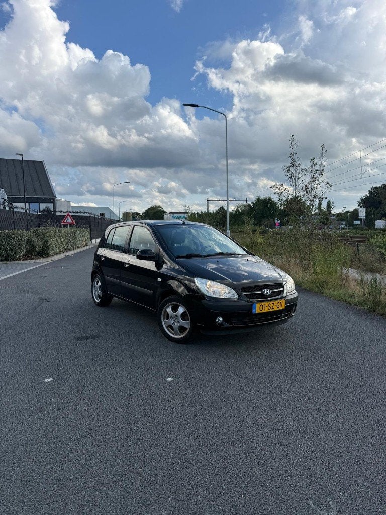 Hyundai Getz 1.4 5DRS 2006 Zwart Airco elek. ramen lichtm., Auto's, Hyundai, Voorwielaandrijving, 450 kg, 40 €/maand, Zwart